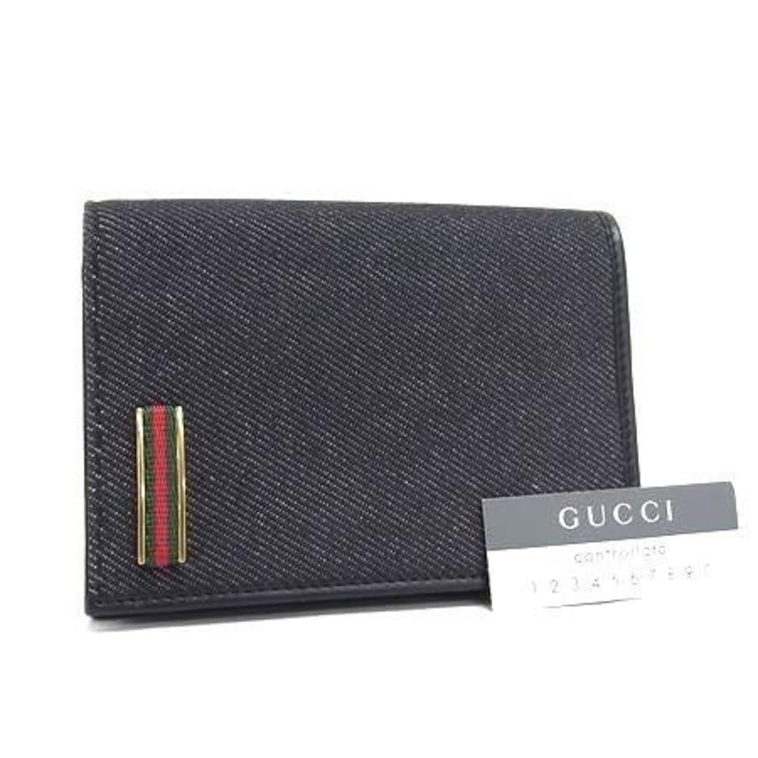 GUCCI Sherry Line 92748 Black Canvas Leather Men's Bi-fold Wallet: --- Catalog ---Category: SizeSize (HxWxD): 12.5cm x 9cm x 2cm / 4.92'' x 3.54'' x 0.78''Category: DesignType: Wallet (bi-fold)Color: BlackGender: MenMaterial: Canvas , Leather Category: GeneralBrand: