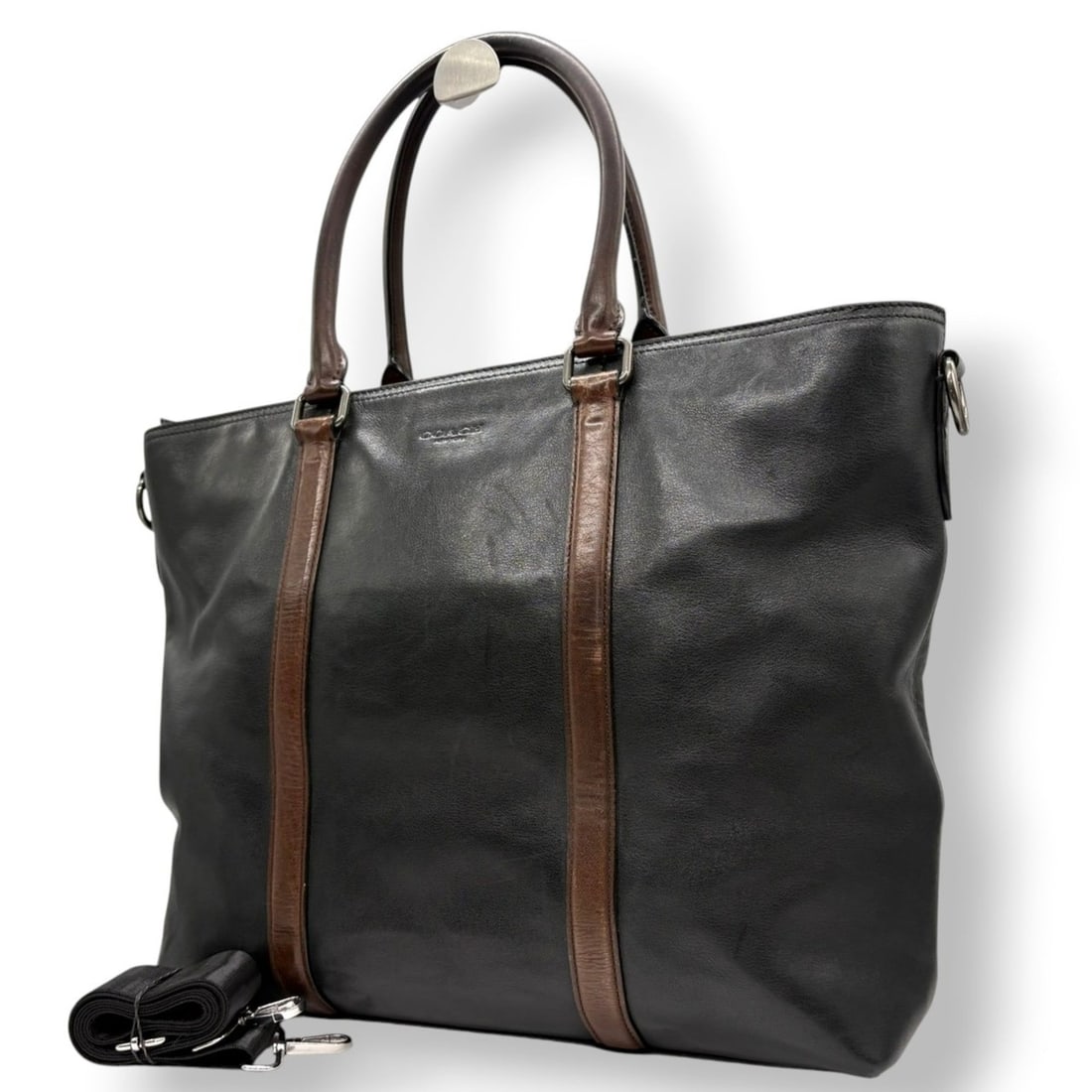 Coach tote bag/shoulder bag, leather, black/brown, silver hardware, men's/women's, s21: --- Catalog ---Category: SizeSize (HxWxD): 31cm x 44cm x 12cm / 12.2'' x 17.32'' x 4.72''Category: DesignType: Shoulder bag, Tote bagColor: Black, BrownGender: Men,WomenMaterial: Leather Category: Gen