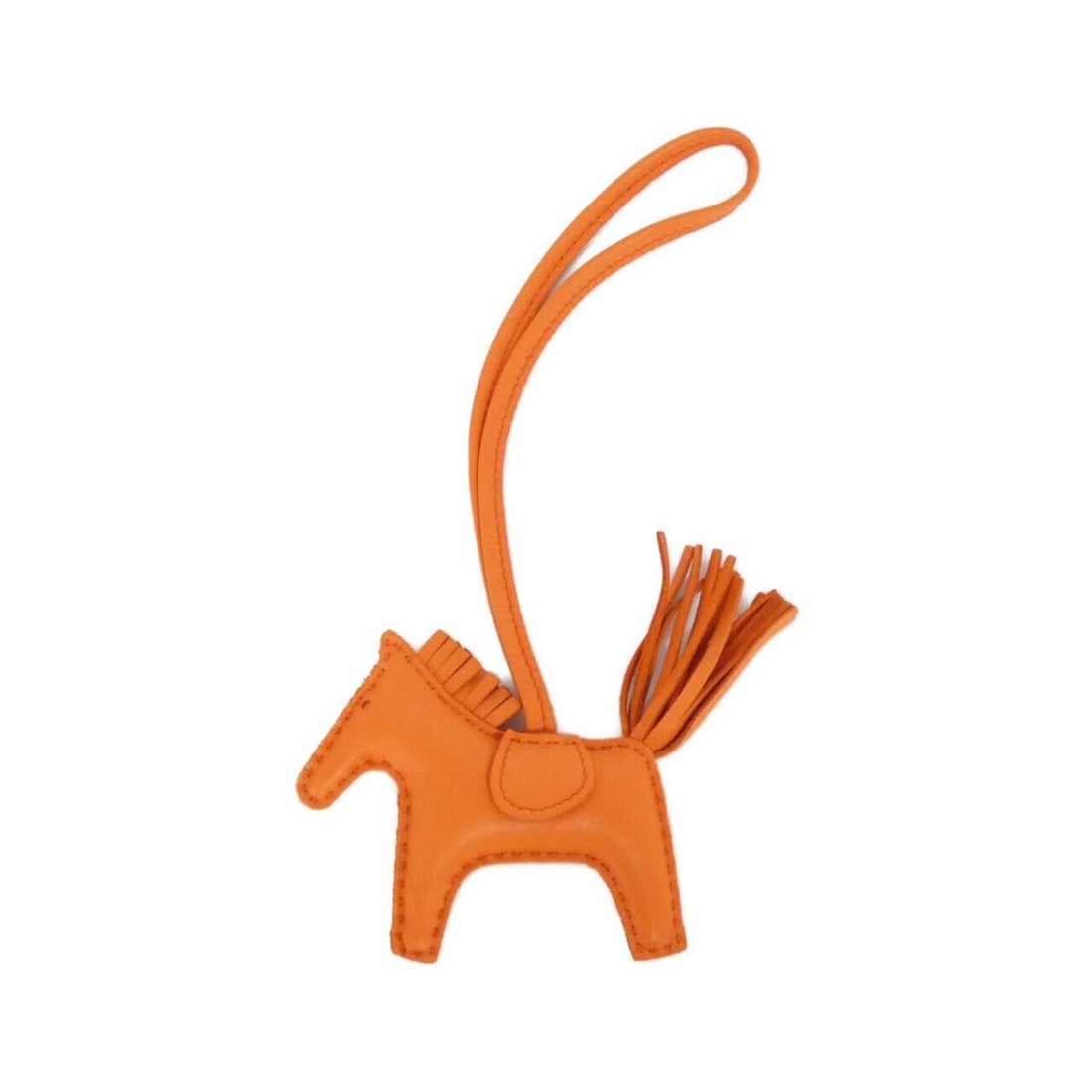 Hermes Rodeo Accessory Bag Charm PM 064929CA: --- Catalog ---Category: SizeSize (HxWxD): 75.00mm x 85.00mm / 2.95'' x 3.35''Category: DesignType: Handbag charmColor: OrangeGender: Men,WomenMaterial: Agneau MiloCategory: GeneralMPN: 064929CABrand: