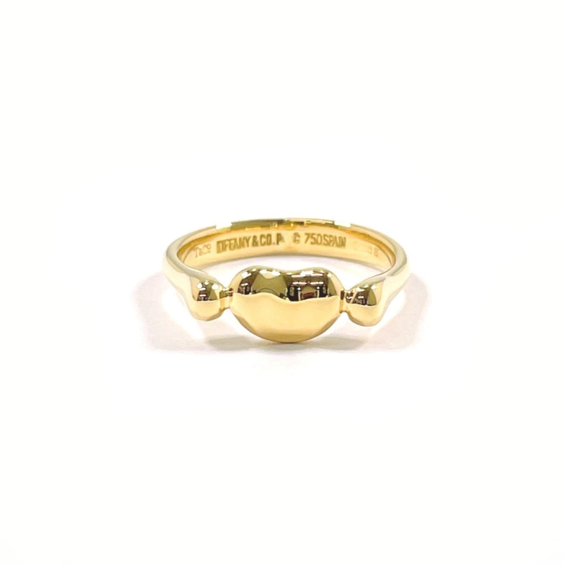 TIFFANY&Co. Tiffany Bean Ring, 18K Yellow Gold, Size 9, Women's: --- Catalog ---Category: PackNumber in Pack: 1Category: SizeJP Size: 9US Size: 5Category: DesignType: Band ringColor: Yellow goldGender: WomenMaterial: Yellow gold (18K)Category: GeneralBrand: Tiffany