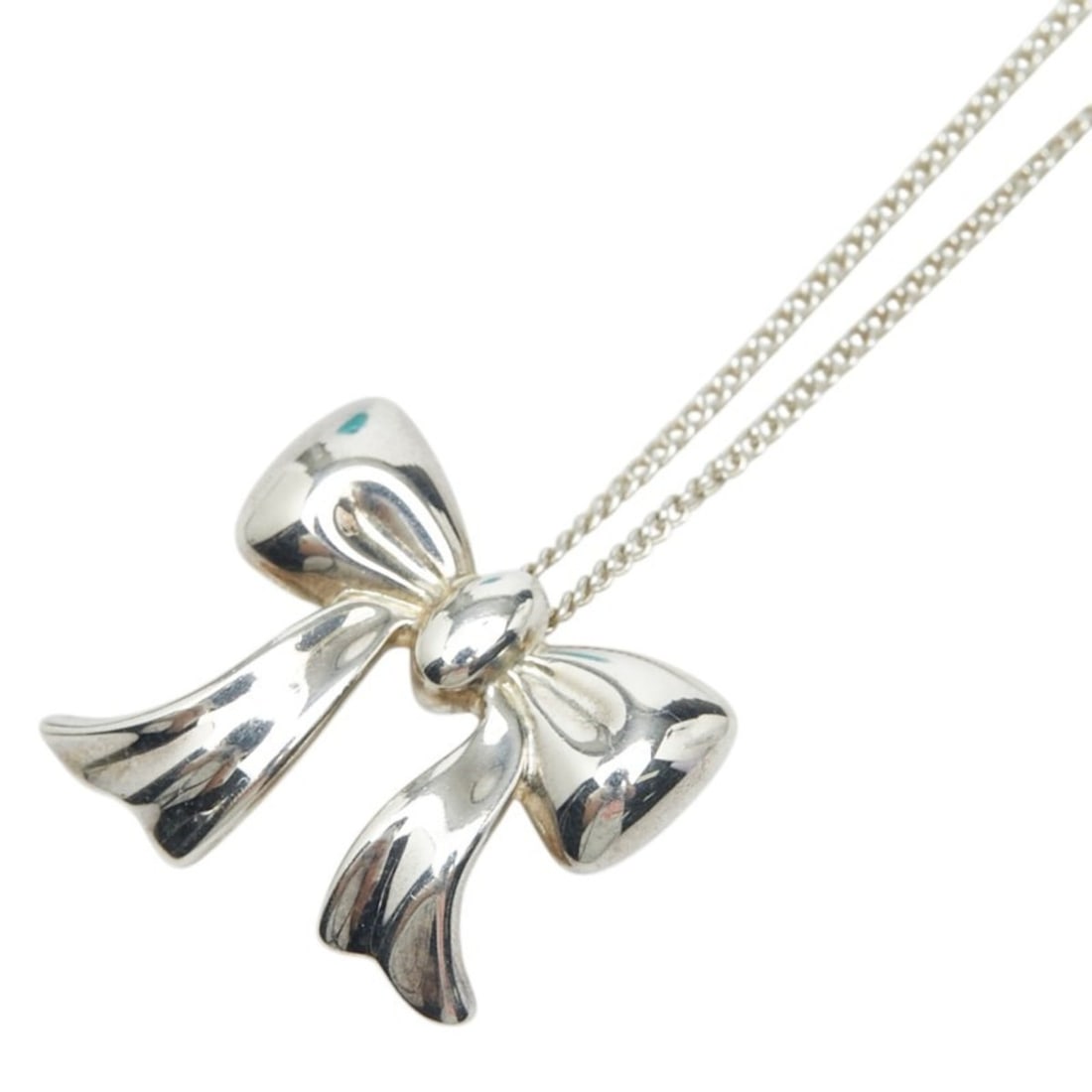 Tiffany & Co. Ribbon Pendant Necklace, SV925 Silver, Women's.: --- Catalog ---Category: SizeWeight: 3g / 0.1oz.Pendant Size: 13.8mm x 15.4mm / 0.54'' x 0.6''Neck Circumference: 46 cm / 18.11''Category: DesignColor: SilverGender: WomenMaterial: Silver 925Pendant T