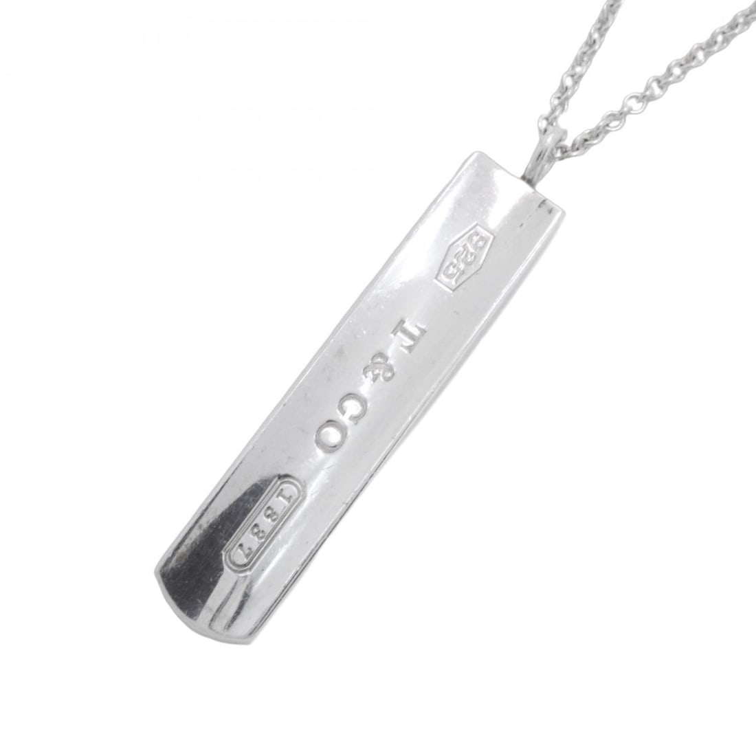 Tiffany & Co. Narrow Bar Necklace, Sterling Silver 925, for Men and Women: --- Catalog ---Category: SizePendant Size: 41.1mm x 8.2mm / 1.61'' x 0.32''Neck Circumference: 46.5 cm / 18.3''Category: DesignGender: Men,WomenMaterial: Silver 925Necklace Type: NecklaceCategory: Gen