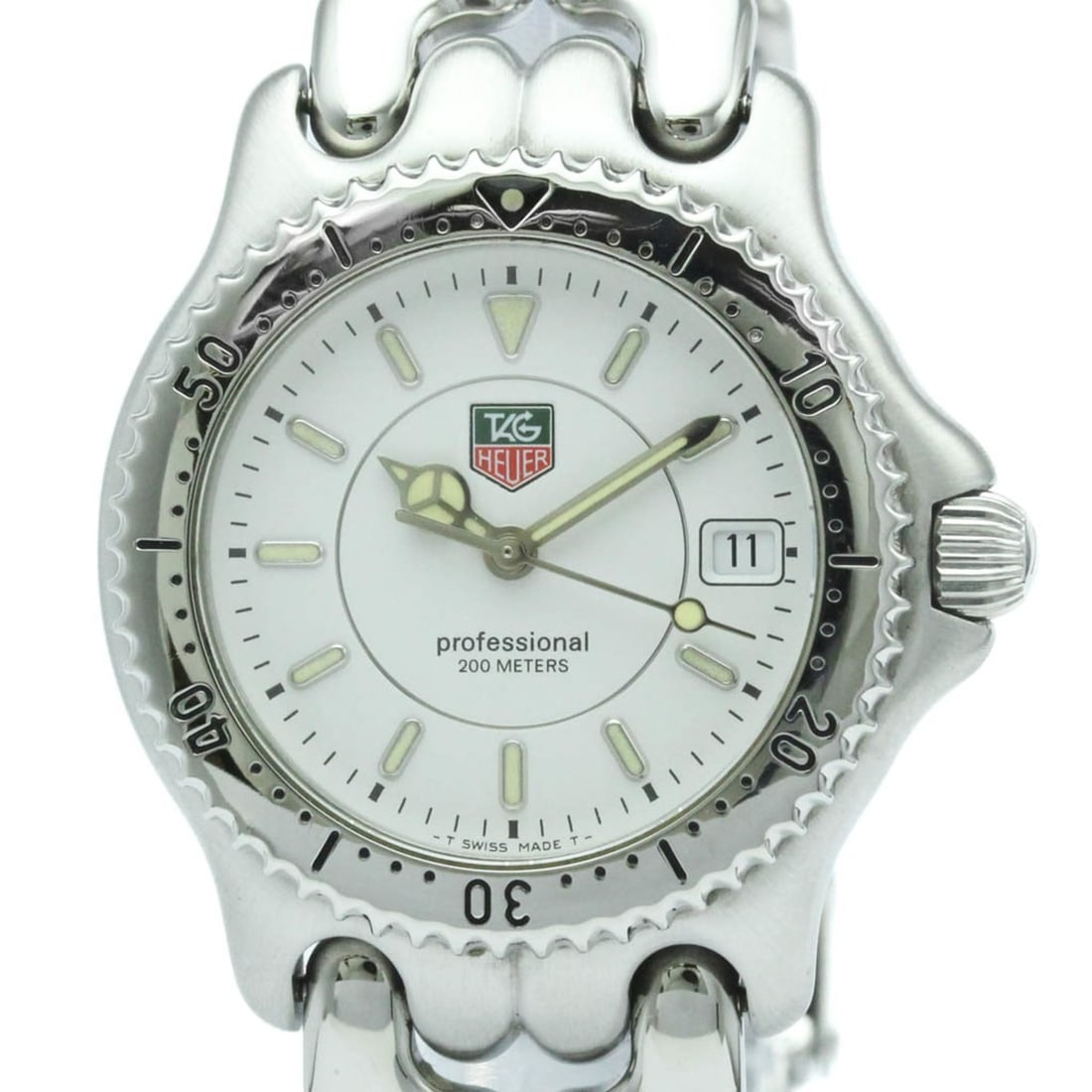 TAG HEUER Sel Professional 200M Steel Mid Size Watch WG1212 Polished: --- Catalog ---Category: SizeCase Diameter: 34mm / 1.34''Category: DesignType: WristwatchStyle: Dress/FormalGender: UnisexColor (Dial): WhiteMaterial (Band): Stainless steelMaterial (Case): Stainless