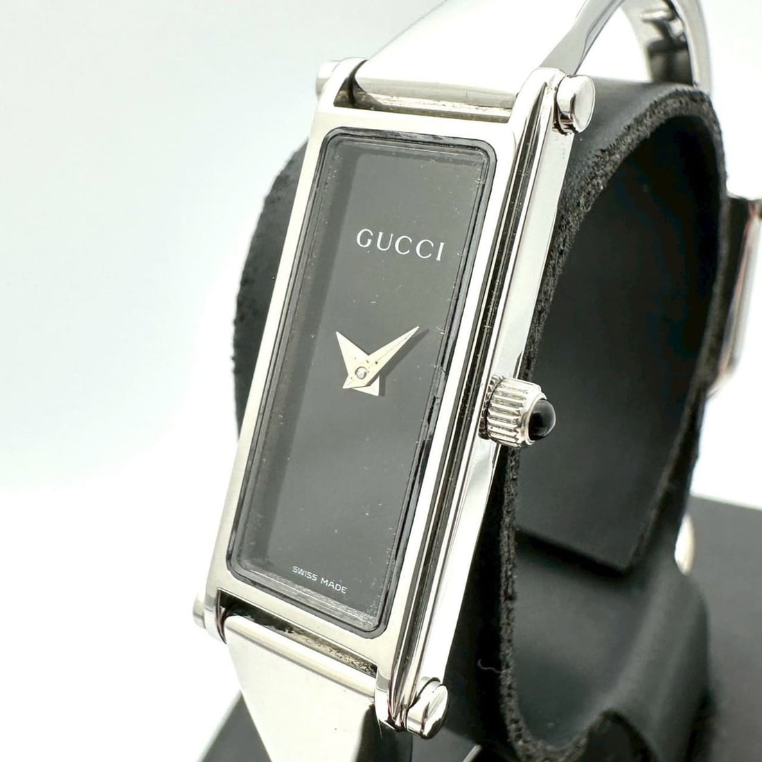 GUCCI Bangle Watch 1500L Quartz Stainless Steel Black Women's: --- Catalog ---Category: SizeWrist Size: 14.5cm - 15cm / 5.7'' - 5.9''Case Diameter: 12mm / 0.47''Category: DesignType: WristwatchGender: WomenColor (Dial): BlackMaterial (Band): Stainless steelMateri