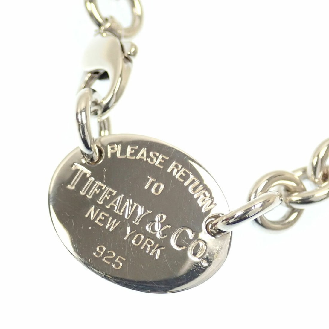 Tiffany & Co. Return to Oval Tag Choker Necklace for Women, SV925, 52.4g, Silver: --- Catalog ---Category: SizePendant Size: 17.7mm x 22.4mm / 0.69'' x 0.88''Neck Circumference: 39.5 cm / 15.55''Category: DesignGender: WomenMaterial: Silver 925Necklace Type: ChokerCategory: General
