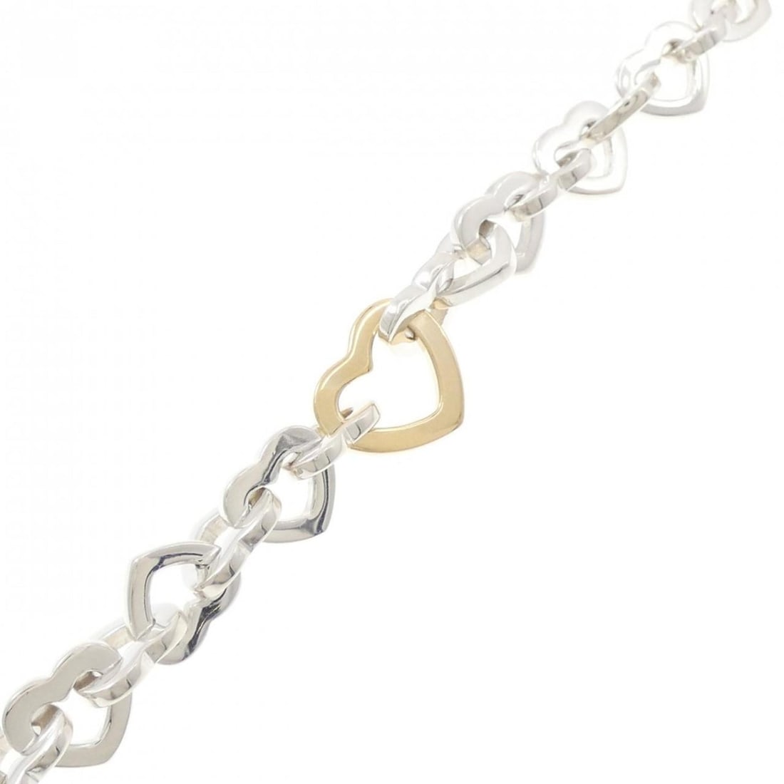 Tiffany Heart Link Bracelet: --- Catalog ---Category: SizeWidth: 1.37cm / 0.53''Weight: 35.1g / 1.23oz.Total Length: 19cm / 7.48''Category: DesignType: Link braceletGender: WomenMaterial: Silver 925, Yellow gold (18K)Category:
