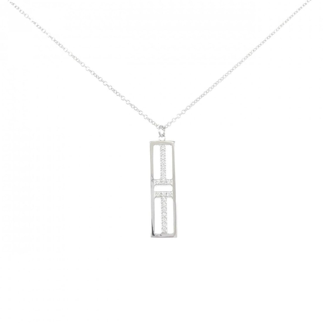 Tiffany & Co. T Two Open Vertical Bar Necklace: --- Catalog ---Category: SizePendant Size: 27.9mm x 6.5mm / 1.09'' x 0.25''Neck Circumference: 46 cm / 18.11''Category: DesignColor: White goldGender: WomenMaterial: White gold (18K)Pendant Type: