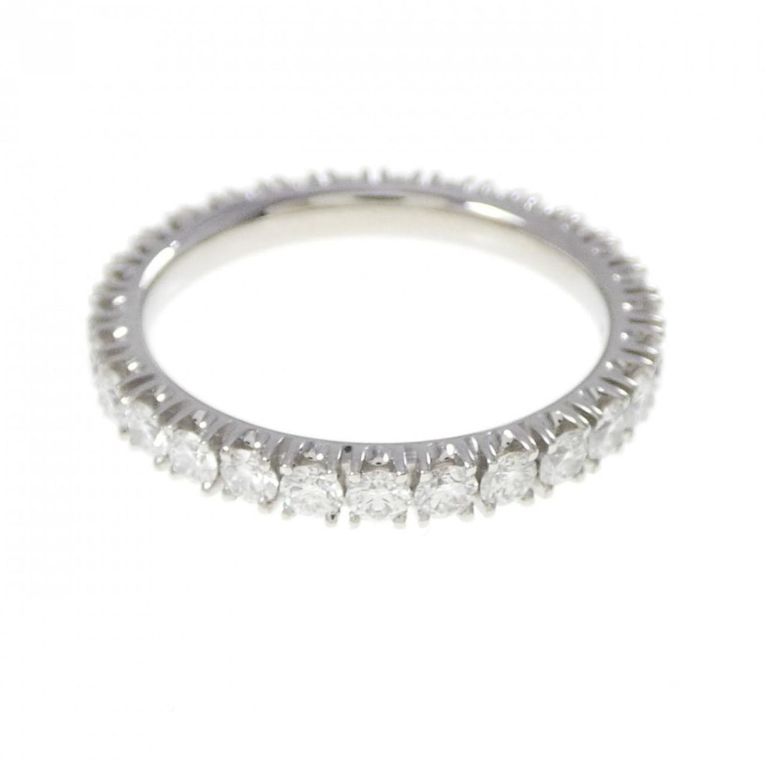 Cartier Etincelle Ring: --- Catalog ---Category: SizeUS Size: 6.5Brand Size: 52Category: DesignType: Band ringColor: PlatinumStone: DiamondGender: WomenMaterial: Platinum 950Category: GeneralMPN: B4087100Brand: Cartier--- It