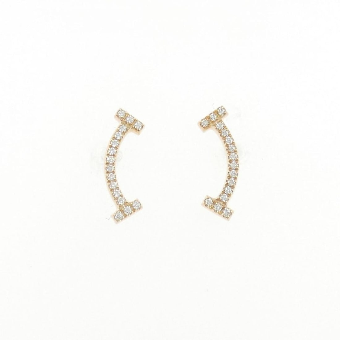 Tiffany T Smile Earrings: --- Catalog ---Category: SizeSize (HxWxD): 13.10mm x 3.70mm / 0.52'' x 0.15''Category: DesignColor: PinkGender: WomenMaterial: Pink goldCategory: GeneralMPN: 60150725Brand: Tiffany--- Item List ---Sec