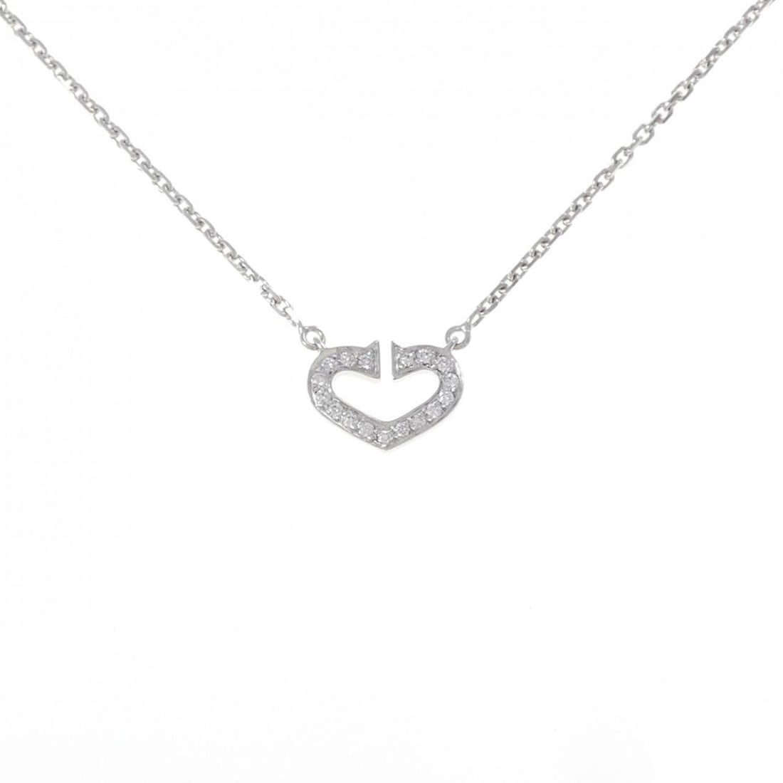 Cartier C Heart Necklace: --- Catalog ---Category: SizePendant Size: 8.8mm x 12.2mm / 0.34'' x 0.48''Neck Circumference: 39 cm / 15.35''Category: DesignColor: White goldStone: DiamondGender: WomenMaterial: White gold