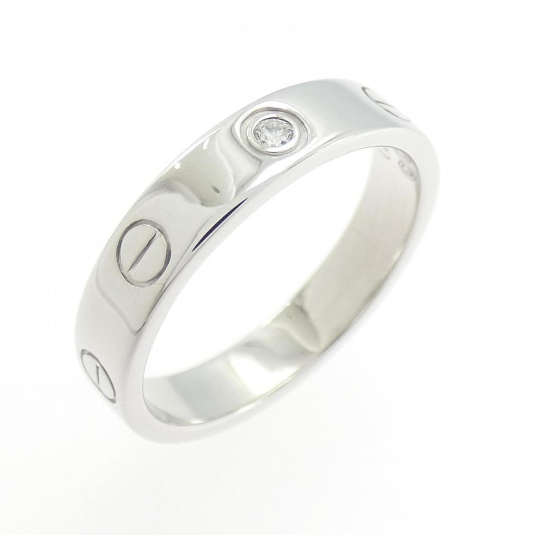 Cartier Mini Love 1P Ring: --- Catalog ---Category: SizeUS Size: 6.5Brand Size: 53Category: DesignType: Band ringColor: White goldStone: DiamondGender: WomenMaterial: White gold (18K)Category: GeneralMPN: B4050500Brand: Cartier