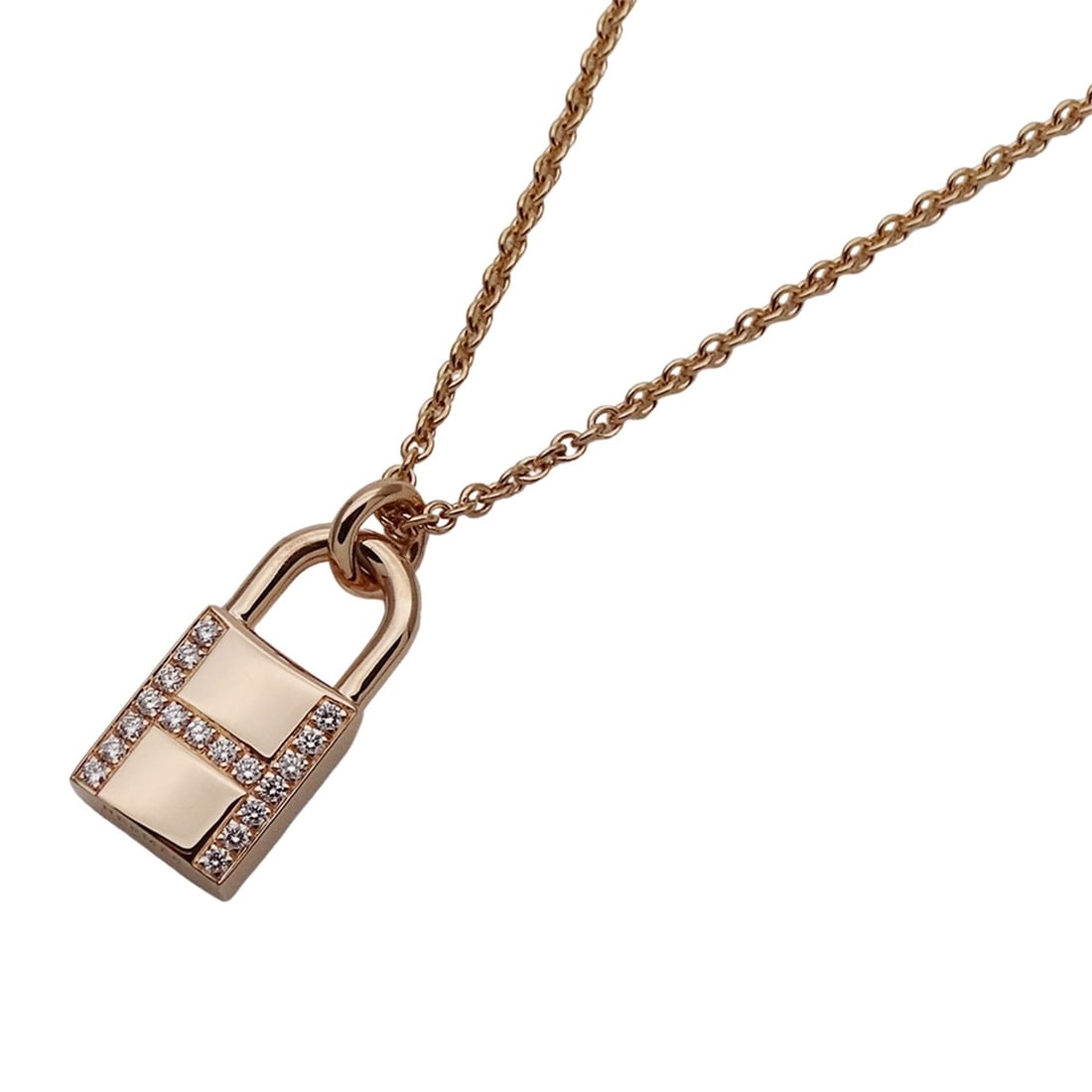 Hermes Kelly Amulette Cadena Necklace for Women, Brand Name, 750PG Pink Gold, Diamond, Polished.: --- Catalog ---Category: SizeWeight: 8.6g / 0.3oz.Pendant Size: 16.5mm x 8mm / 0.64'' x 0.31''Neck Circumference: 38 cm - 40 cm / 14.96'' - 15.74''Category: DesignColor: Pink goldStone: DiamondGender: