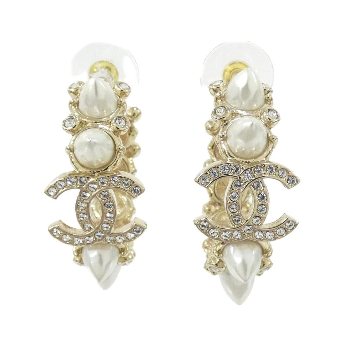 Chanel earrings: --- Catalog ---Category: SizeSize (HxWxD): 25.00mm x 10.00mm / 0.98'' x 0.39''Category: DesignType: Hoop earringsColor: WhiteStone: CrystalGender: WomenCategory: GeneralBrand: Chanel--- Item List ---S