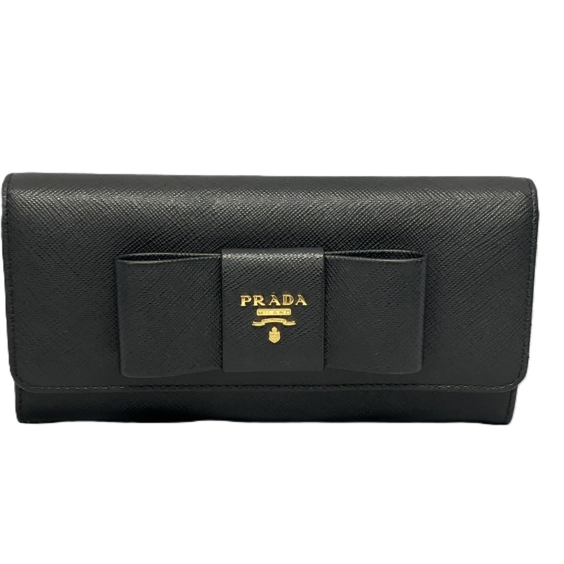 PRADA Ribbon Motif Bi-fold Long Wallet SAFFIANO FIOCCO 1MH132 Embossed Leather Black: --- Catalog ---Category: SizeSize (HxWxD): 18.5cm x 9cm x 3cm / 7.28'' x 3.54'' x 1.18''Category: DesignType: Long wallet (bi-fold)Color: BlackGender: WomenMaterial: Saffiano Category: GeneralMPN: 1MH