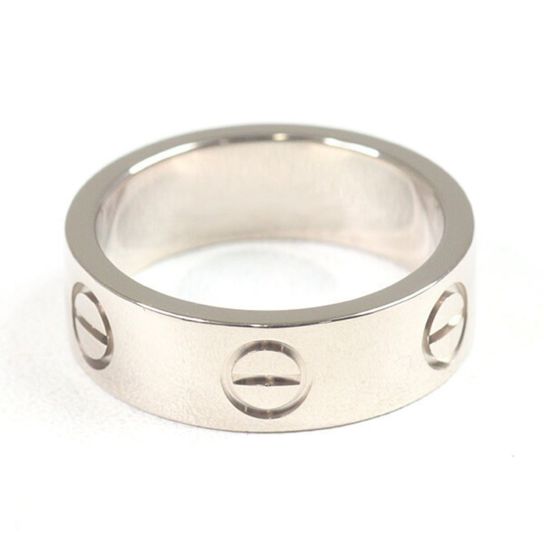 Cartier Love Ring Classic Model 18KWG #48 (actual size 7.5) Width 5.5mm 750WG Refinished: --- Catalog ---Category: SizeUS Size: 4.5Brand Size: 48Category: DesignType: Band ringColor: White goldGender: WomenMaterial: White gold (18K)Category: GeneralBrand: Cartier--- Item List ---Section: C