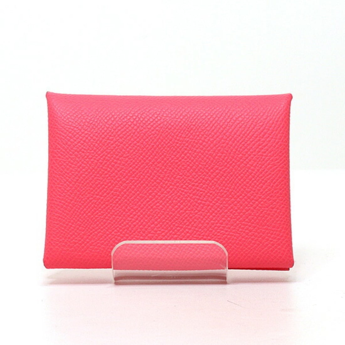 Hermes Calvi Duo Pink Card Case Coin (B Stamp) Epsom Leather: --- Catalog ---Category: DesignType: Card caseColor: PinkGender: WomenMaterial: Epsom leather Category: GeneralBrand: HermesCountry of Origin: FranceCategory: Physical PropertiesSize (HxWxD): 7.5cm x