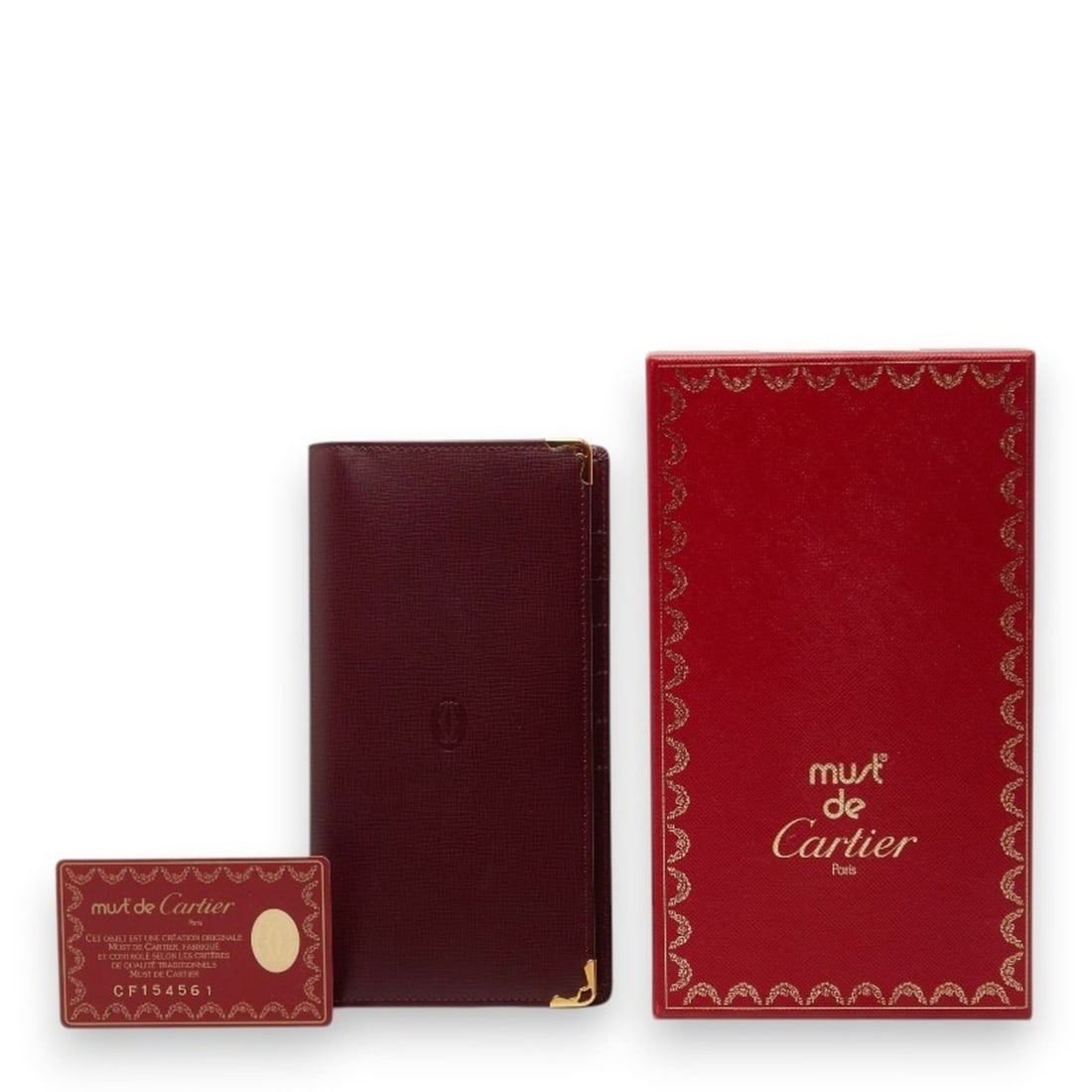 Cartier Must Line Bi-fold Multi-Wallet Bordeaux Wine Red Leather Women's CARTIER: --- Catalog ---Category: SizeSize (HxWxD): 18cm x 9.5cm x 2.5cm / 7.08'' x 3.74'' x 0.98''Category: DesignType: Long wallet (bi-fold)Color: Bordeaux, Wine redGender: WomenMaterial: Leather Category: G