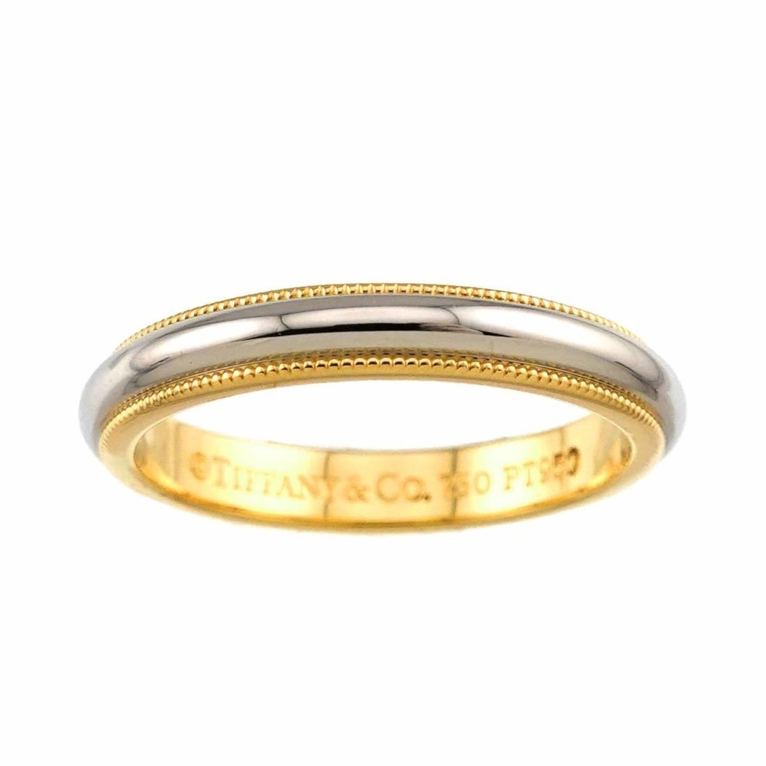 Tiffany & Co. Milgrain Band Ring, 3.5mm wide, Platinum (Pt) and 18K Yellow Gold (750).: --- Catalog ---Category: SizeJP Size: 15US Size: 7.5Category: DesignType: Band ringColor: GoldGender: WomenMaterial: Yellow gold (18K)Category: GeneralBrand: Tiffany--- Item List ---Section: Condition