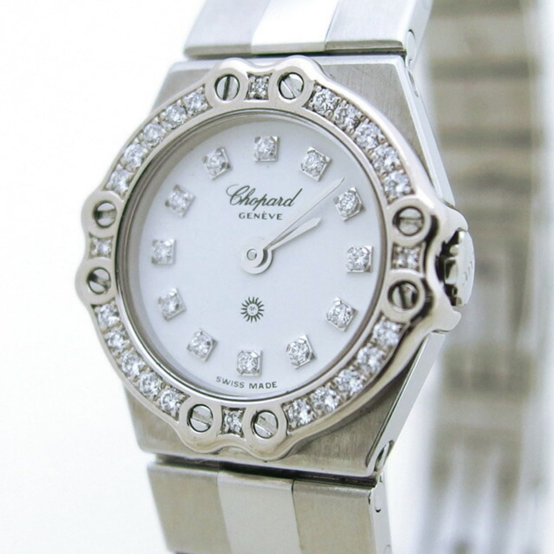 Chopard St. Moritz Diamond Bezel 12-Diamond Ladies Watch: --- Catalog ---Category: SizeWrist Size: 16cm / 6.29''Case Diameter: 18mm / 0.71''Category: DesignType: WristwatchGender: WomenColor (Dial): WhiteMaterial (Band): Stainless steelMaterial (Case): Stain