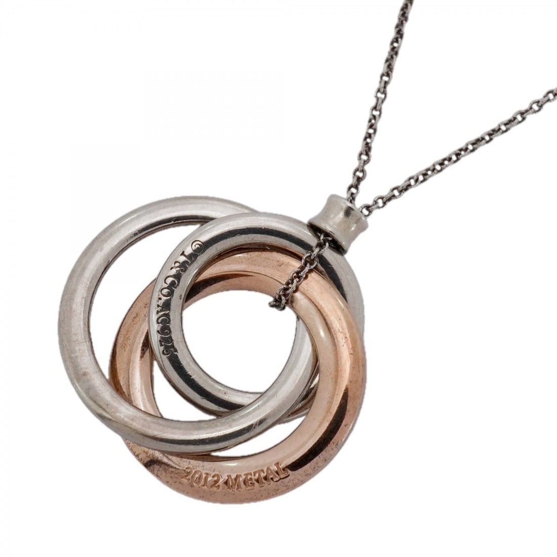 Tiffany & Co. Necklace 1837 Interlocking Sterling Silver 925 Rubedo Metal Women's: --- Catalog ---Category: SizePendant Size: 24.5mm x 22.7mm / 0.96'' x 0.89''Neck Circumference: 44 cm / 17.32''Category: DesignGender: WomenMaterial: Silver 925Necklace Type: NecklaceCategory: General