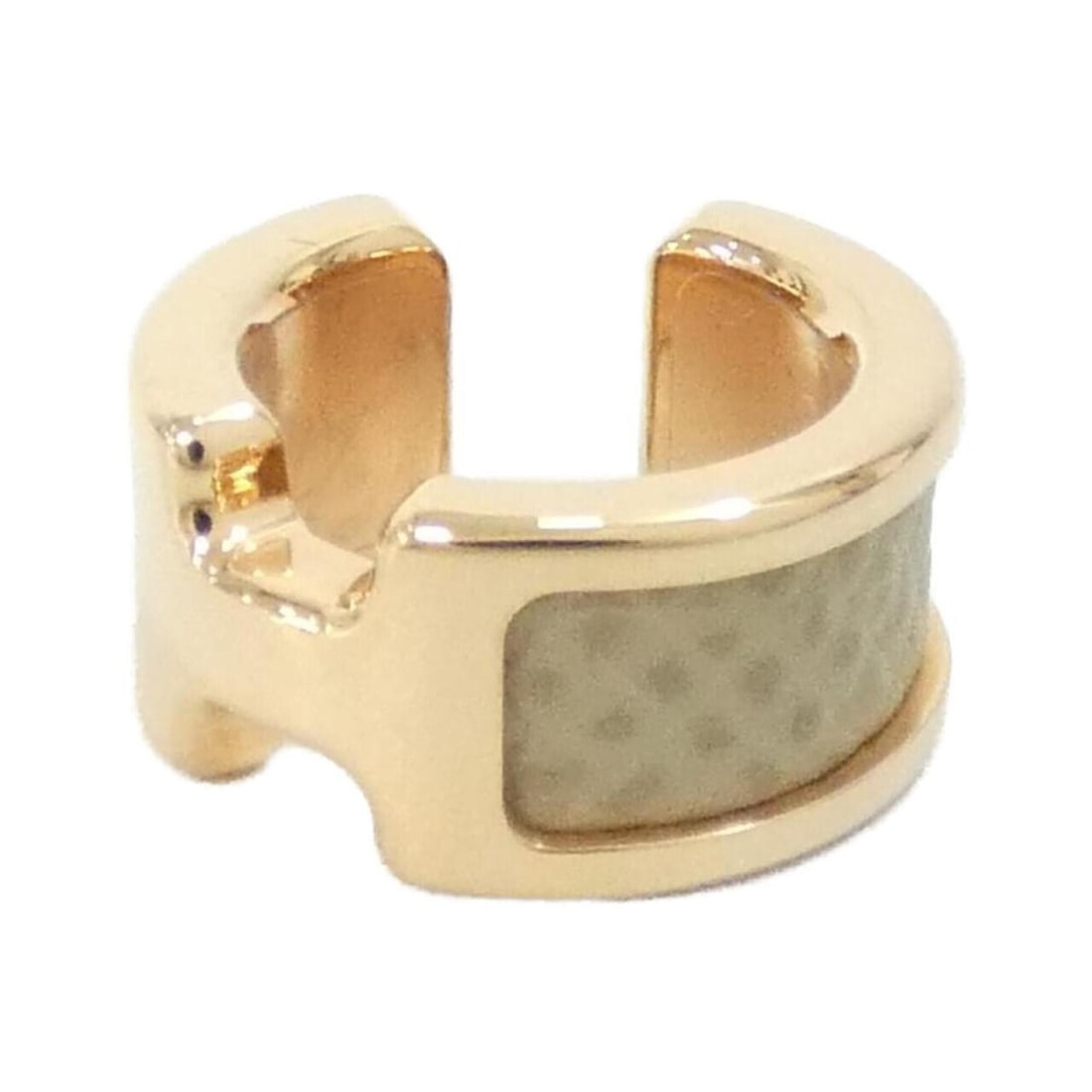 Hermes Olympe 010734CD Ear Cuff: --- Catalog ---Category: SizeSize (HxWxD): 12.00mm x 7.00mm / 0.47'' x 0.28''Category: DesignType: EarcuffColor: Beige, Rose goldGender: Women,MenMaterial: Epsom leatherCategory: GeneralMPN: