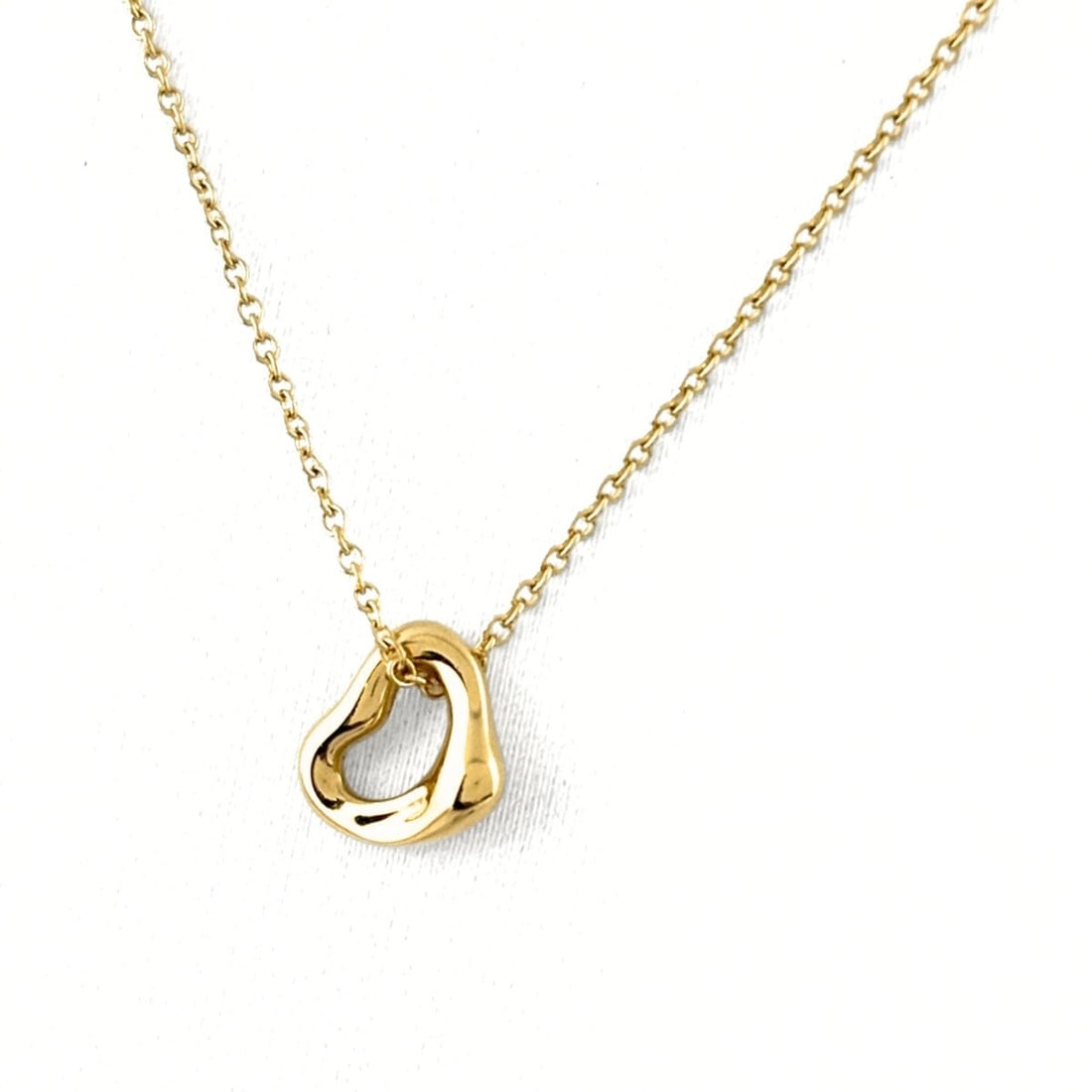 Tiffany & Co. Open Heart Mini Necklace, Yellow Gold Pendant, Elsa Peretti Design, 750 Gold, Women's.: --- Catalog ---Category: SizePendant Size: 7mm x 6.3mm / 0.27'' x 0.24''Neck Circumference: 40.5 cm / 15.94''Category: DesignGender: WomenMaterial: Yellow goldPendant Type: PendantNecklace Type: Neckl