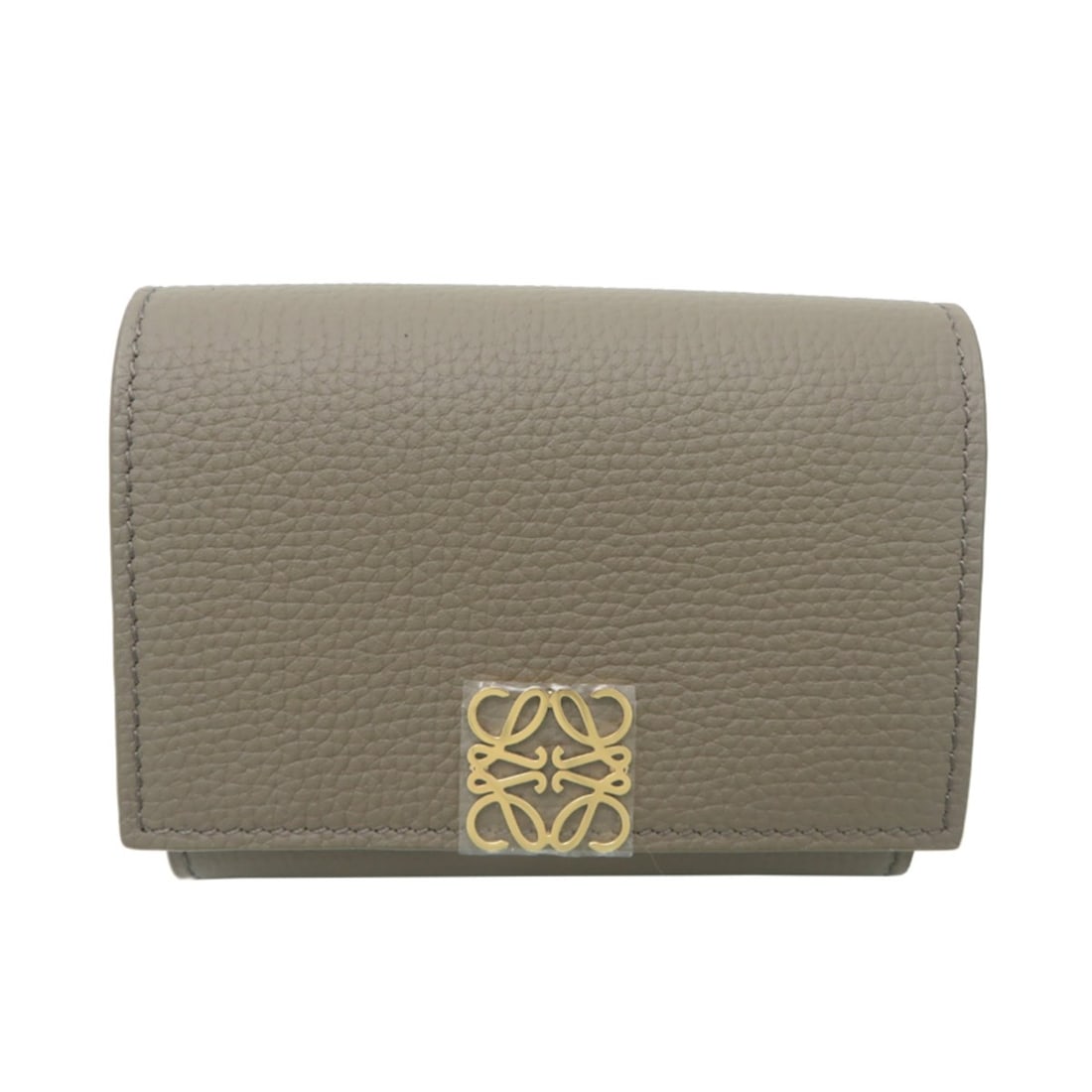 Loewe Anagram Trifold Wallet for Women, C821TR2X16 3170, Pebble Grain Calf Leather, Taupe: --- Catalog ---Category: SizeSize (HxWxD): 8cm x 10.2cm x 4.5cm / 3.14'' x 4.01'' x 1.77''Category: DesignType: Wallet (tri-fold)Gender: WomenMaterial: Leather Category: GeneralMPN: C821TR2X16 3170Bra