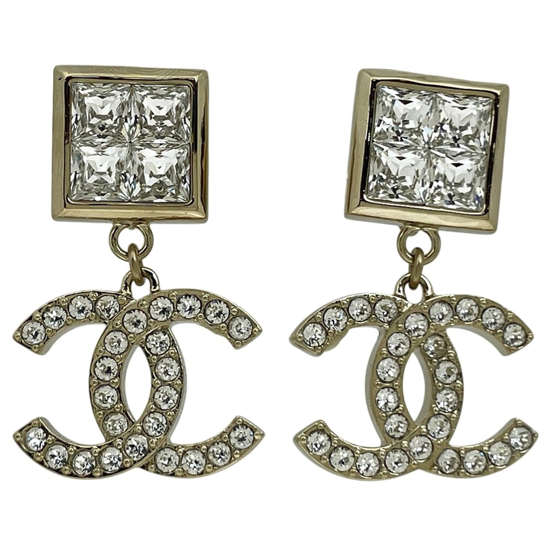 Chanel Coco Mark Rhinestone Dangle Earrings, Gold Plated, for Women: --- Catalog ---Category: SizeStone Size (HxW): 25.00mm x 39.00mm / 0.98'' x 1.54''Category: DesignColor: SilverGender: WomenMaterial: RhinestoneCategory: GeneralBrand: Chanel--- Item List ---Section: