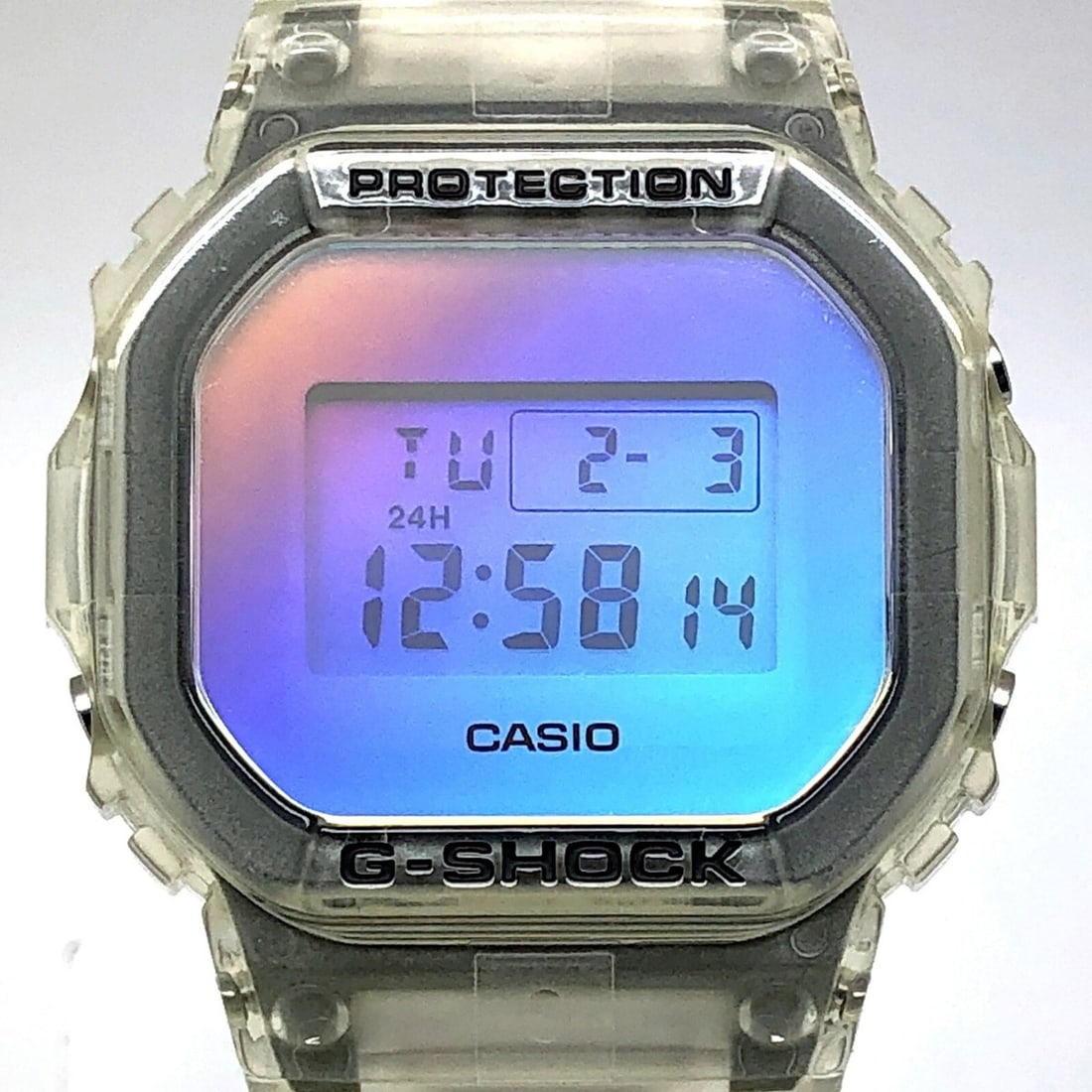G-SHOCK CASIO DW-5600SRS-7 Iridescent Color Series Skeleton Watch with Rainbow Metallization, Square: --- Catalog ---Category: Category: DesignType: WristwatchColor: Clear, Multi-colorGender: MenDisplay: DigitalColor (Dial): Multi-colorMaterial (Band): ResinCategory: GeneralLine: G-ShockBrand: CasioMo