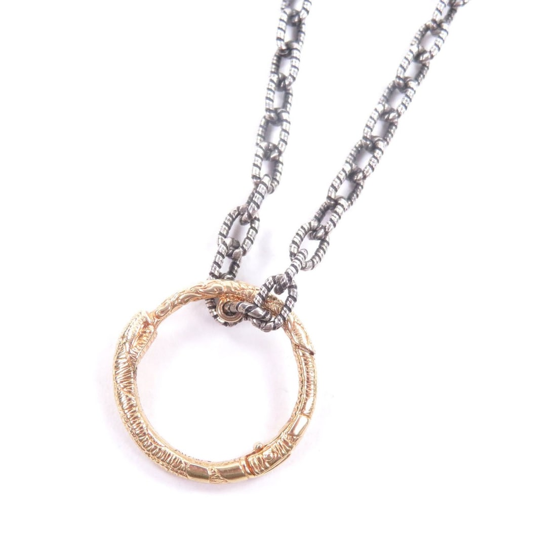 GUCCI 461997 Ouroboros AG925 AU750 Accessory Chain Necklace Silver Gold Made in Italy Total Weight: --- Catalog ---Category: SizeWeight: 17.83g / 0.62oz.Diameter: 17mm / 0.66''Pendant Size: 2mm / 0.07''Neck Circumference: 60 cm / 23.62''Category: DesignColor: Gold, SilverGender: MenMaterial: Silver