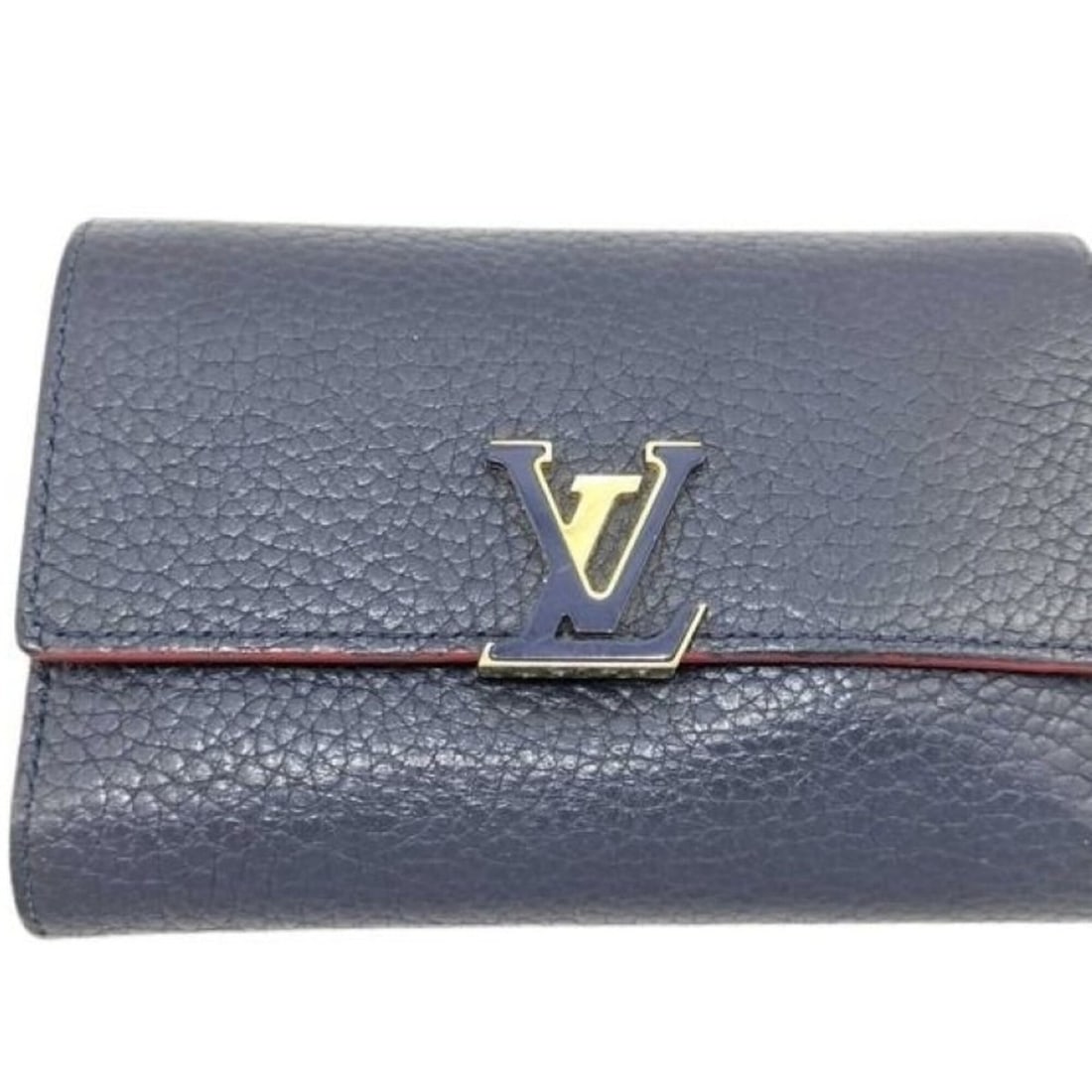 LOUIS VUITTON Louis Vuitton Tri-fold Wallet Portefeuille Capucines Compact M63741 Marine Rouge: --- Catalog ---Category: SizeSize (HxWxD): 10cm x 13.5cm x 3cm / 3.93'' x 5.31'' x 1.18''Category: DesignType: Wallet (tri-fold)Color: Marine rougeGender: WomenMaterial: Leather Leather/Fur Type: Taur