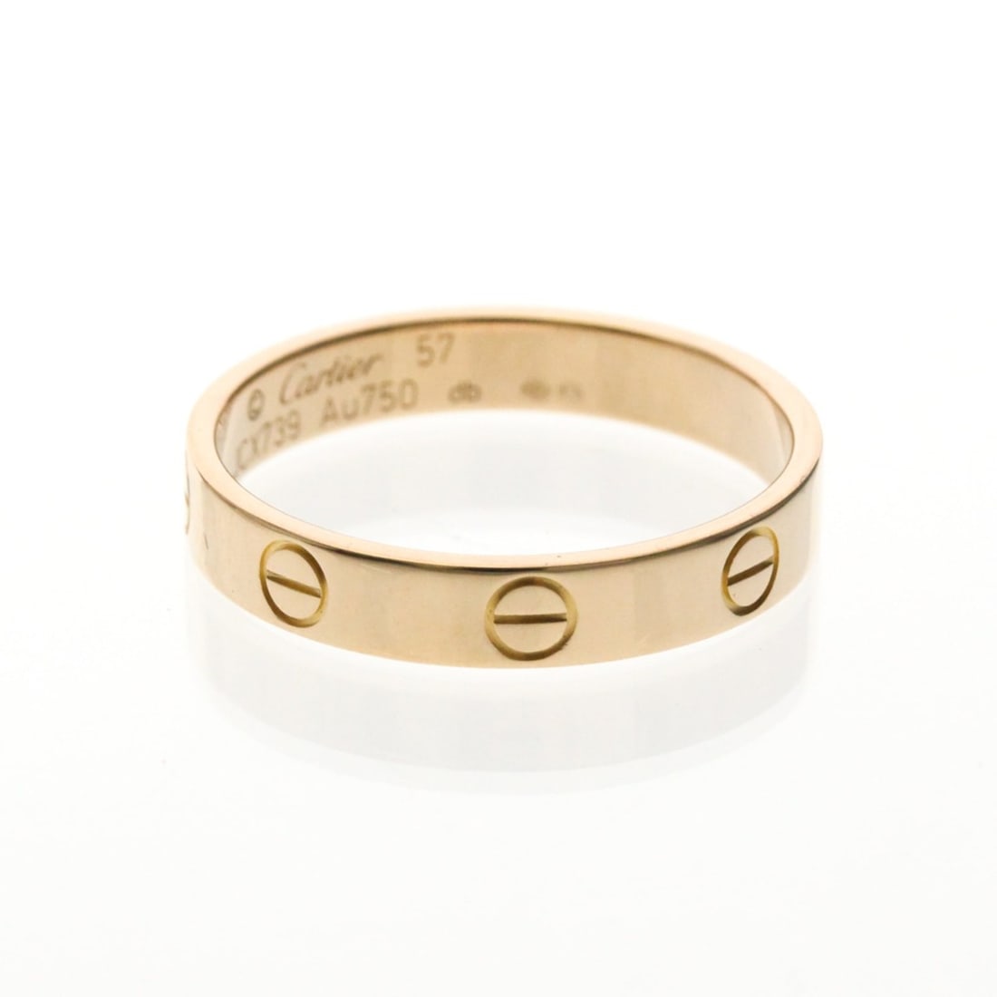 Cartier Mini Love Ring Pink Gold (18K) Fashion No Stone Band Ring Pink Gold: --- Catalog ---Category: SizeWidth: 3.5mm / 0.14''Weight: 3.5g / 0.12oz.JP Size: 17US Size: 8Brand Size: 57Category: DesignType: Band ringColor: Pink goldMetal: GoldStone: No StoneStyle: