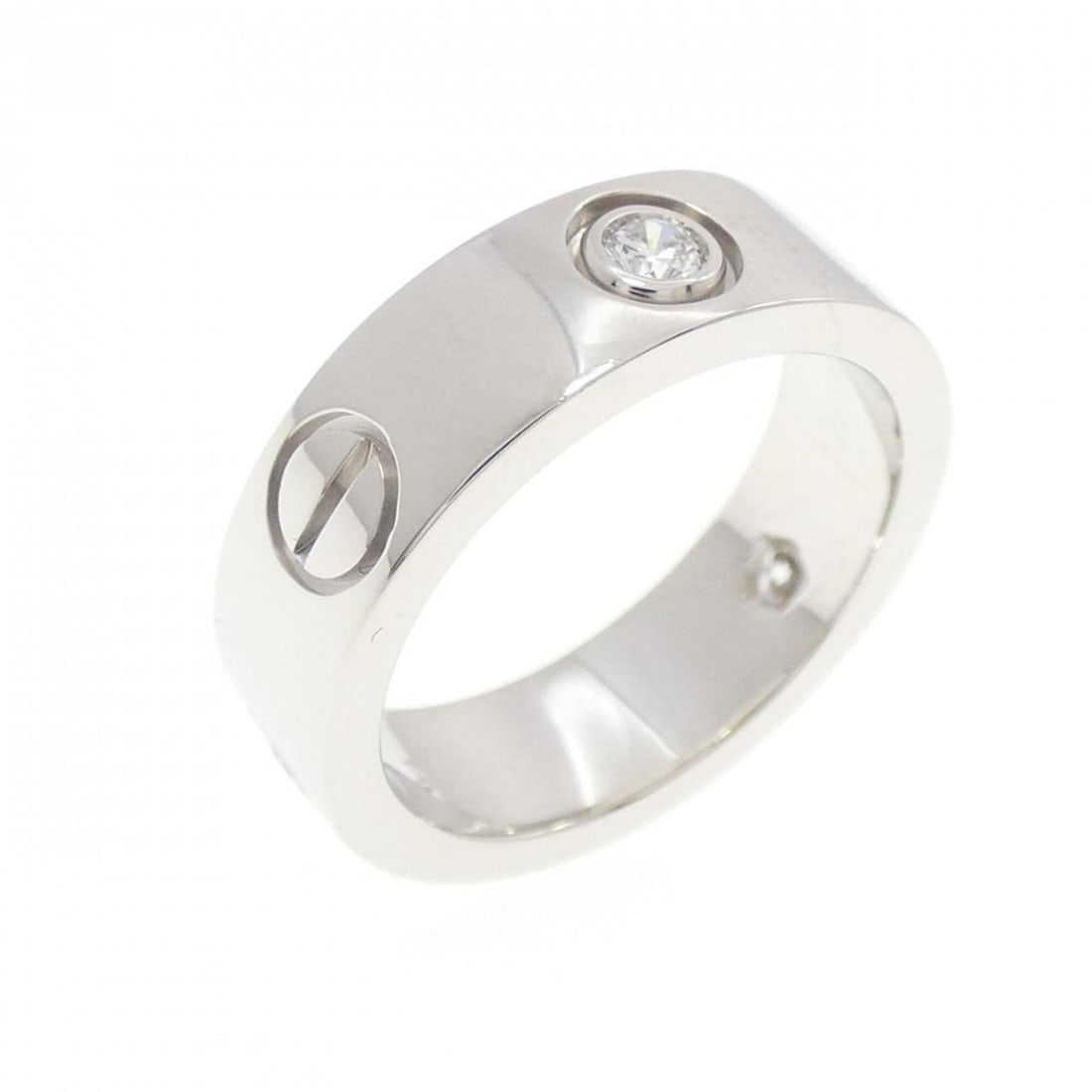 Cartier Love Half-Diamond Ring: --- Catalog ---Category: SizeUS Size: 4.5Brand Size: 48Category: DesignType: Band ringColor: White goldStone: DiamondGender: WomenMaterial: White gold (18K)Category: GeneralMPN: B4032500Brand: