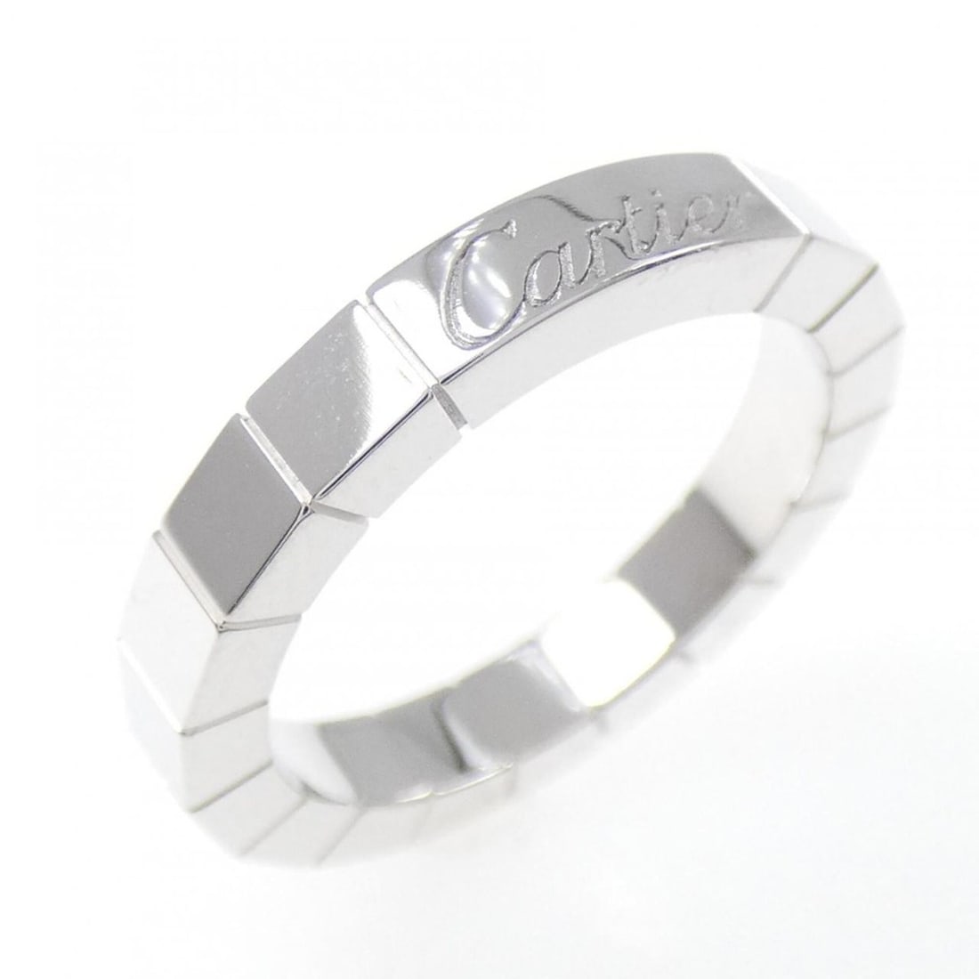 Cartier Lanieres Ring: --- Catalog ---Category: SizeUS Size: 4.5Brand Size: 48Category: DesignType: Band ringColor: White goldGender: WomenMaterial: White gold (18K)Category: GeneralMPN: B4045000Brand: Cartier--- Item List