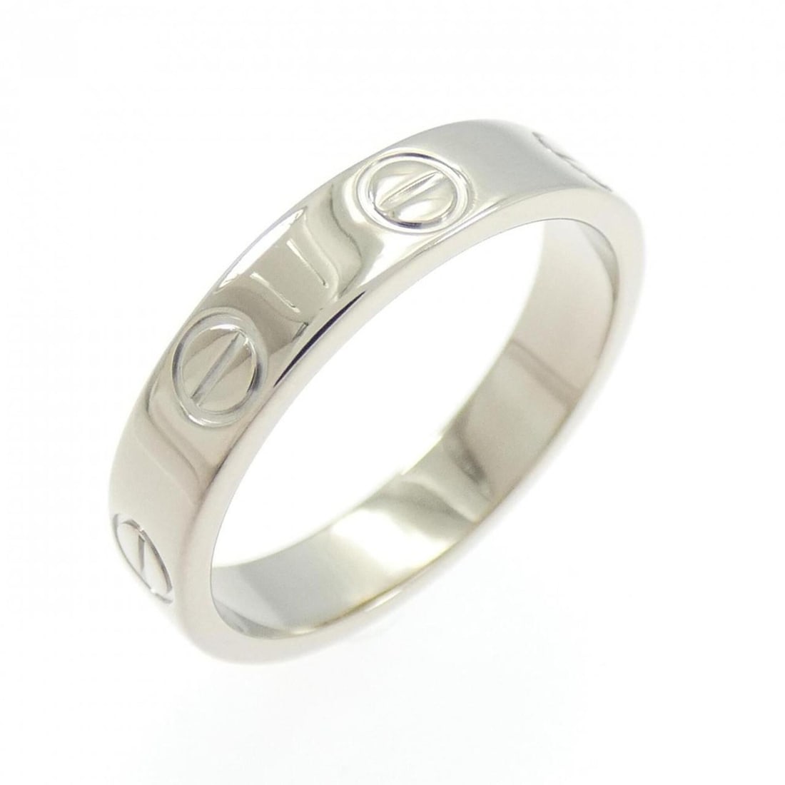 Cartier Mini Love Ring: --- Catalog ---Category: SizeUS Size: 5Brand Size: 49Category: DesignType: Band ringGender: WomenMaterial: White gold (18K)Category: GeneralMPN: B4085100Brand: Cartier--- Item List ---Section: