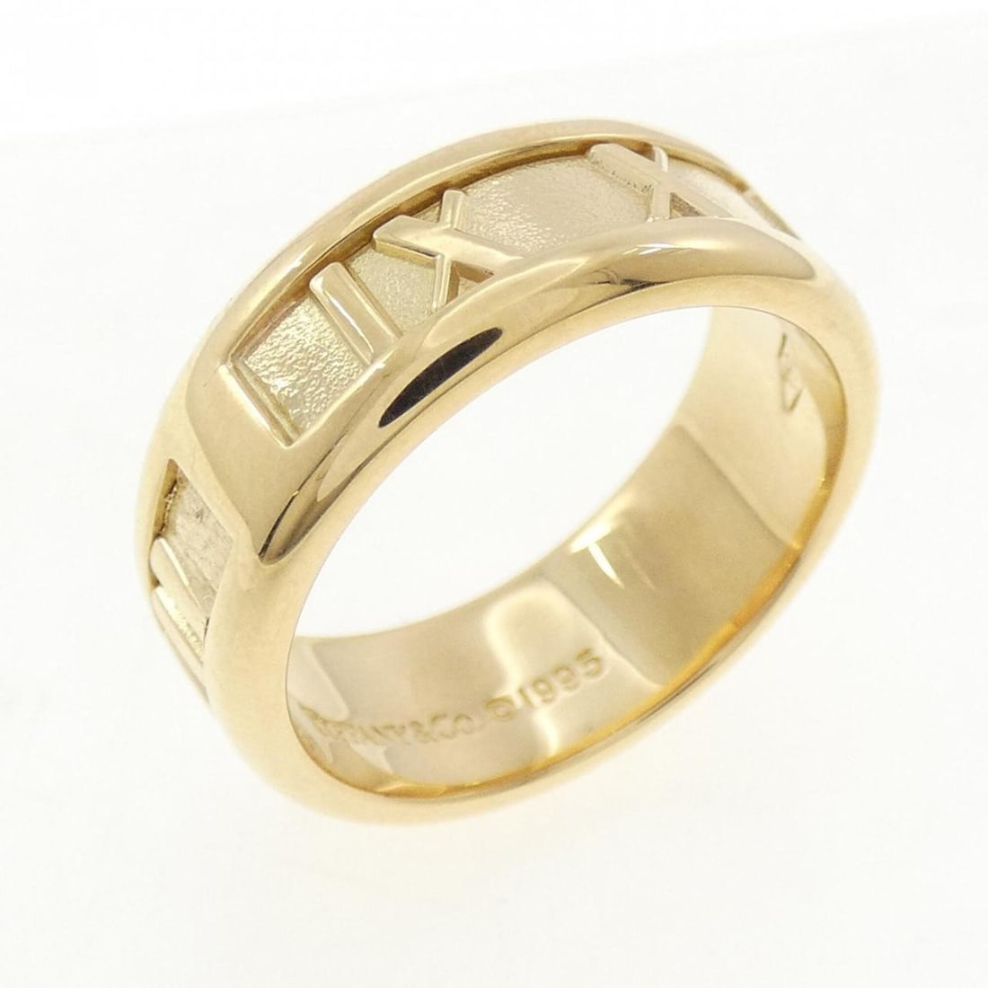 Tiffany Atlas Ring: --- Catalog ---Category: SizeJP Size: 12US Size: 6.5Category: DesignType: Band ringGender: WomenMaterial: Yellow gold (18K)Category: GeneralBrand: Tiffany--- Item List ---Section: ConditionRanking: Ra