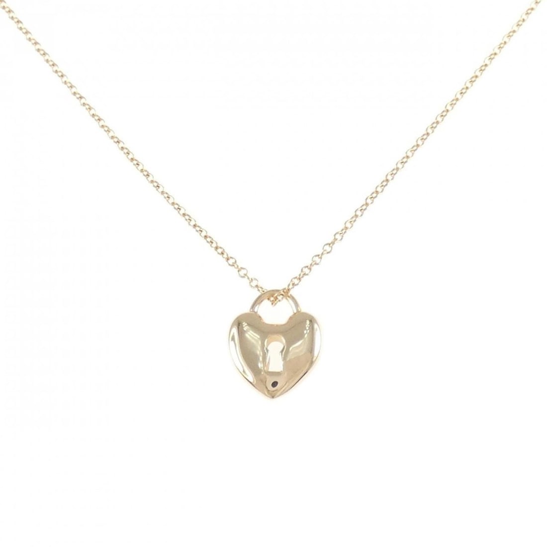 Tiffany Heart Lock Mini Necklace: --- Catalog ---Category: SizePendant Size: 11mm x 9.2mm / 0.43'' x 0.36''Neck Circumference: 41 cm / 16.14''Category: DesignColor: Pink goldGender: WomenMaterial: Pink gold (18K)Pendant Type: