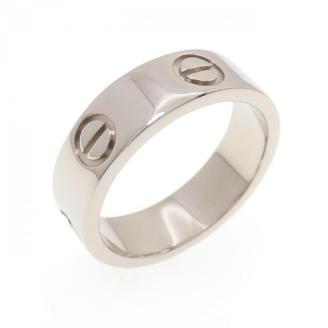 Cartier Love Ring: --- Catalog ---Category: SizeUS Size: 6Brand Size: 51Category: DesignType: Band ringColor: White goldGender: WomenMaterial: White gold (18K)Category: GeneralMPN: B4084700Brand: Cartier--- Item List