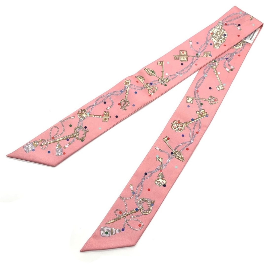 Hermes Twilly Scarf Muffler, Le Pour Pink Silk: --- Catalog ---Category: SizeSize (LxW): 5cm x 86cm / 1.96'' x 33.85''Category: DesignType: ScarfColor: PinkMaterial: Silk Category: GeneralLine: TwillyBrand: Hermes--- Item List ---Section: Condition