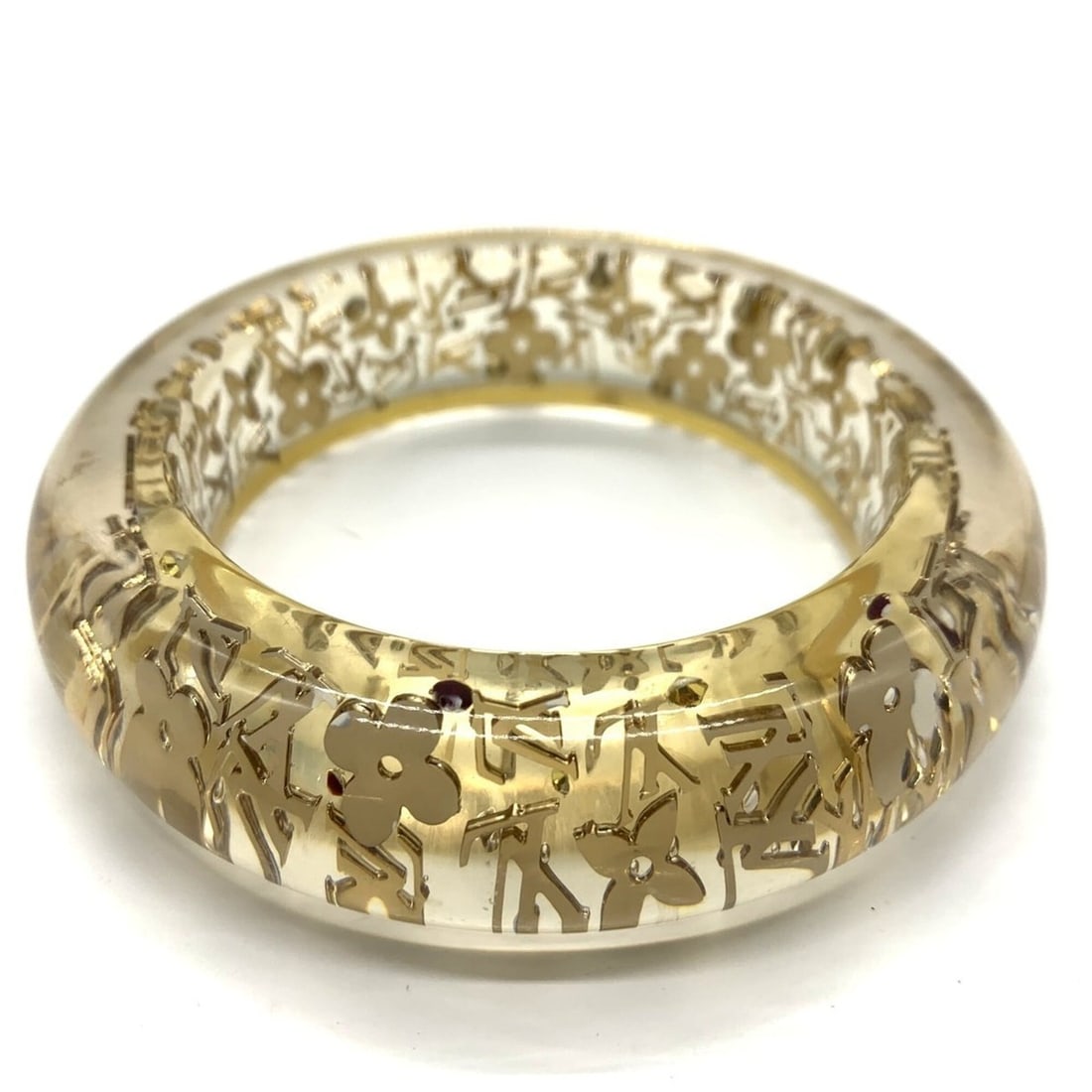 Louis Vuitton Bracelet Inclusion GM M65865 Clear Gold Bangle for Women LOUIS VUITTON: --- Catalog ---Category: SizeWidth: 2cm / 0.78''Length: 20cm / 7.87''Weight: 80g / 2.82oz.Category: DesignType: BangleColor: ClearStone: Crystal, SwarovskiGender: WomenMaterial: ResinCategory: General