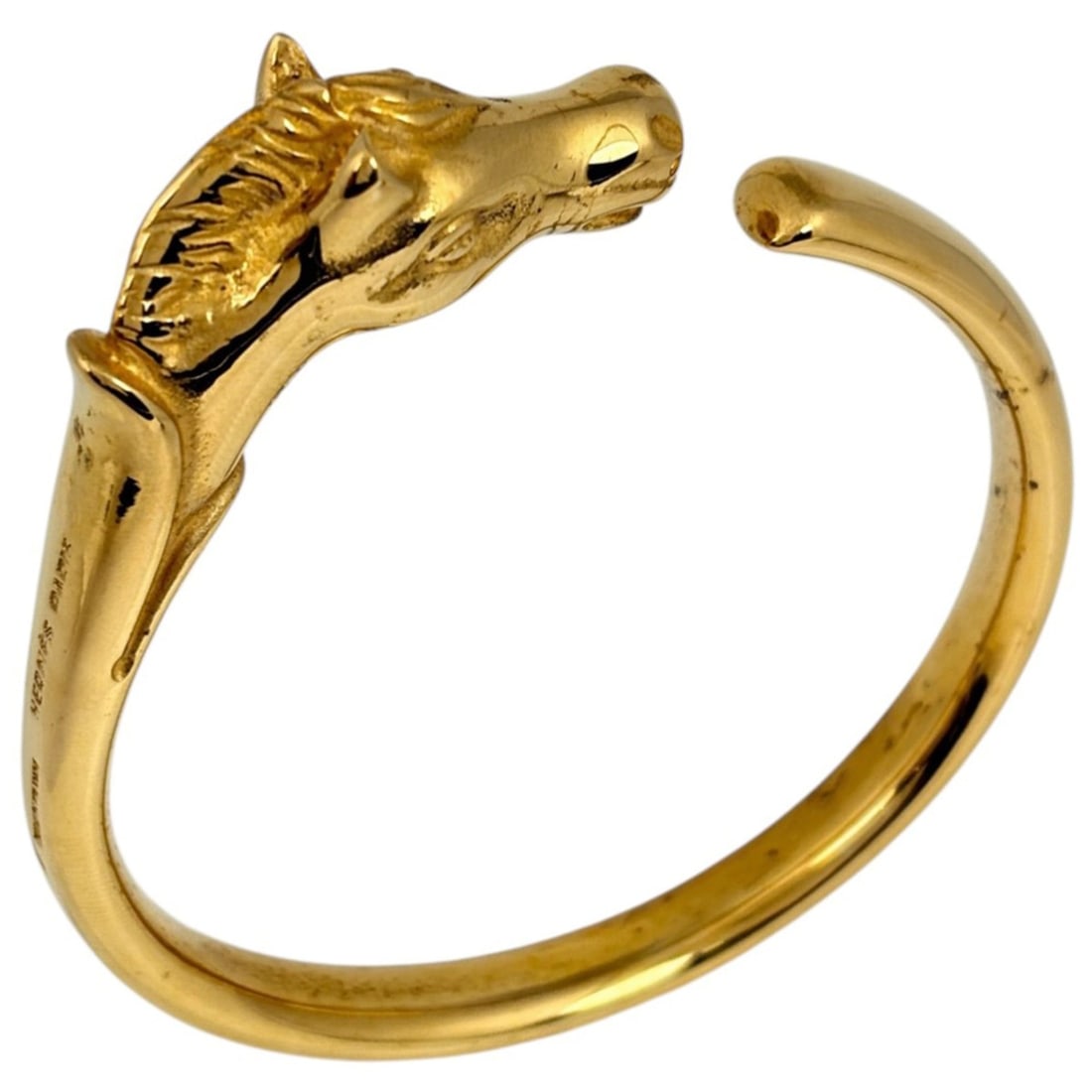 Hermes Cheval Horse Bangle - Motif GP Gold Women's: --- Catalog ---Category: SizeStone Diameter: 19.5cm / 7.67''Category: DesignType: BangleColor: GoldGender: WomenMaterial: Gold platingCategory: GeneralBrand: Hermes--- Item List ---Section: ConditionR
