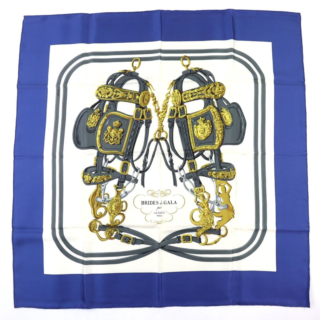 HERMES Carre 90 BRIDES de GALA (Ceremonial Horse Bridle) 100% Silk Scarf/Muffler - Blue & White Made: --- Catalog ---Category: SizeSize (LxW): 88cm x 89cm / 34.64'' x 35.03''Category: DesignType: ScarfColor: Blue, WhiteGender: WomenMaterial: Silk Category: GeneralBrand: HermesCountry of Origin: France