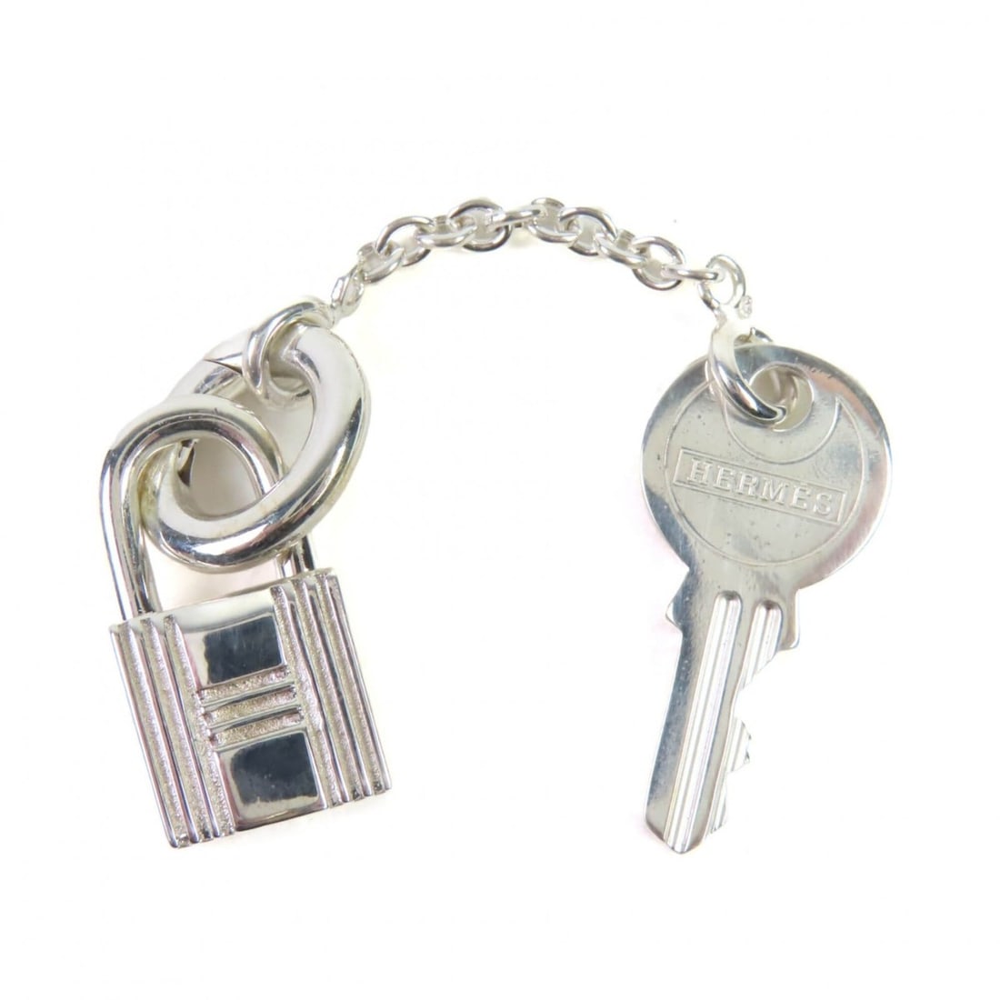 HERMES SV925 Cadena Key Motif H Logo Necklace Pendant Top - Silver Accessory Weight 8.11g Women's: --- Catalog ---Category: SizeWeight: 8.11g / 0.28oz.Pendant Size: 73mm x 10mm / 2.87'' x 0.39''Category: DesignMetal: SilverMetal Purity: Silver925Pendant Type: PendantNecklace Type: PendantCategory: