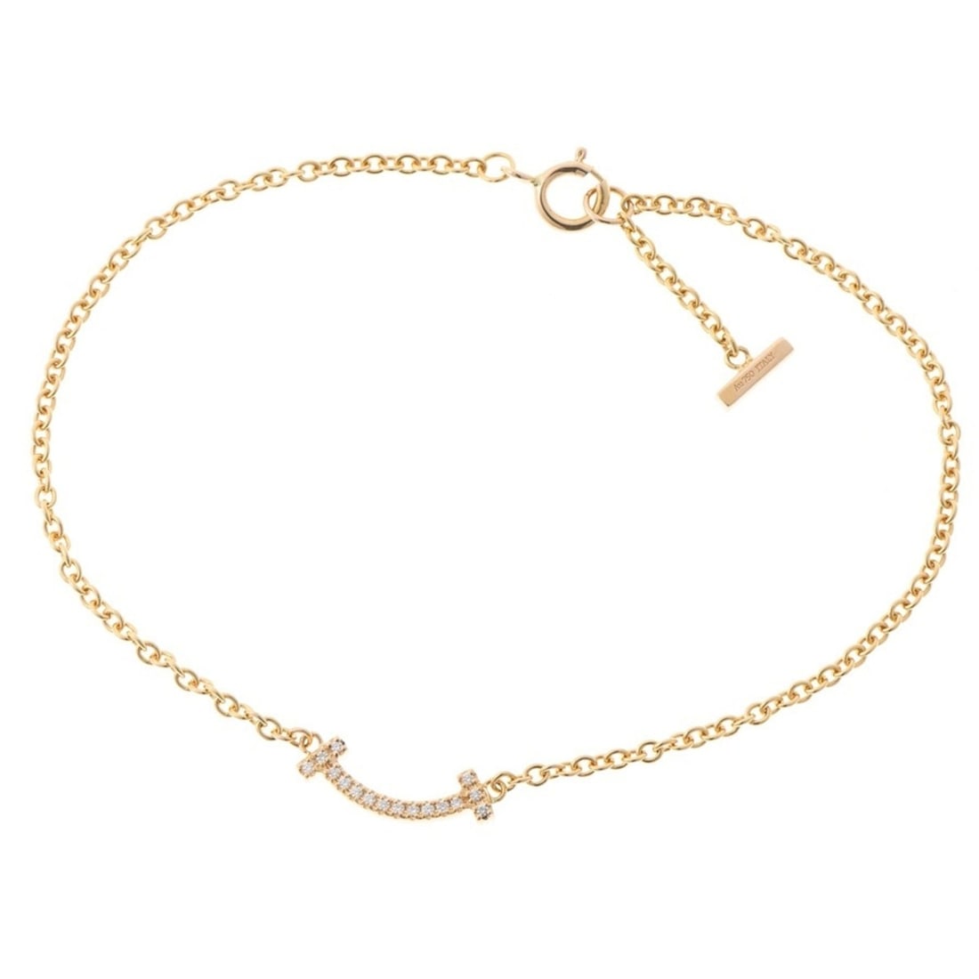 Tiffany & Co. T Smile Mini Bracelet with Diamonds 62994576 18K Yellow Gold: --- Catalog ---Category: SizeLength: 16.5cm / 6.49''Category: DesignType: Charm braceletColor: Yellow goldGender: WomenMaterial: Yellow gold (18K)Category: GeneralMPN: 62994576Brand: TiffanyCountry of