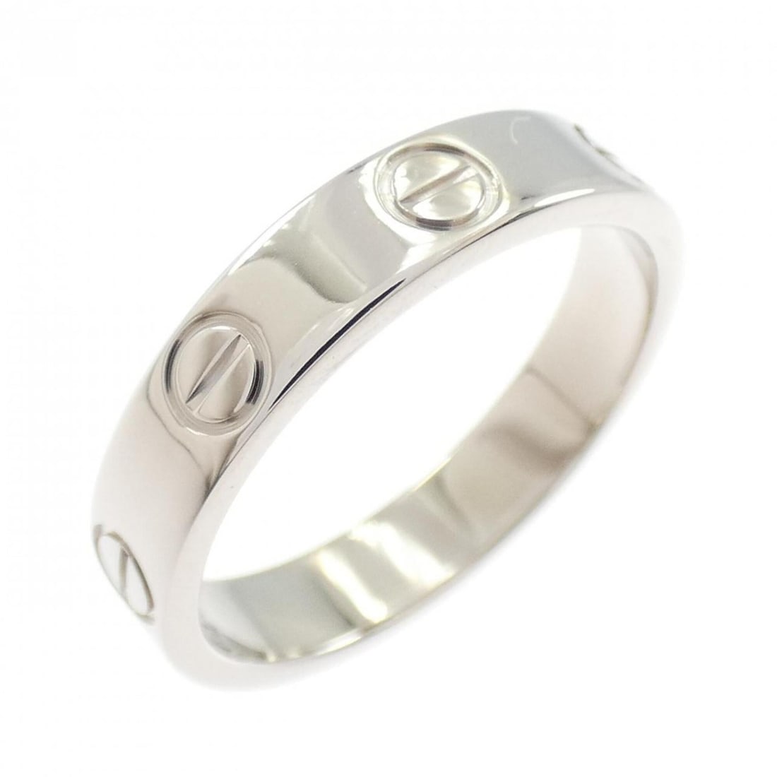 Cartier Mini Love Ring: --- Catalog ---Category: SizeUS Size: 5.5Brand Size: 50Category: DesignType: Band ringColor: White goldGender: WomenMaterial: White gold (18K)Category: GeneralBrand: Cartier--- Item List ---Section: