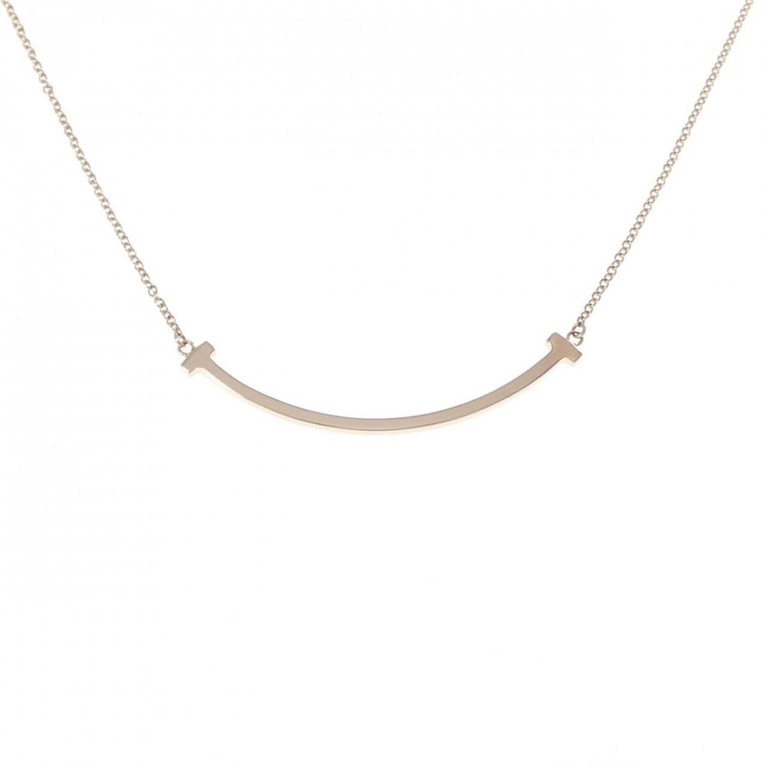 Tiffany T Smile Small Necklace: --- Catalog ---Category: SizePendant Size: 3.5mm x 37mm / 0.13'' x 1.45''Neck Circumference: 41 cm - 45 cm / 16.14'' - 17.71''Category: DesignGender: WomenMaterial: Pink gold (18K)Pendant Type: