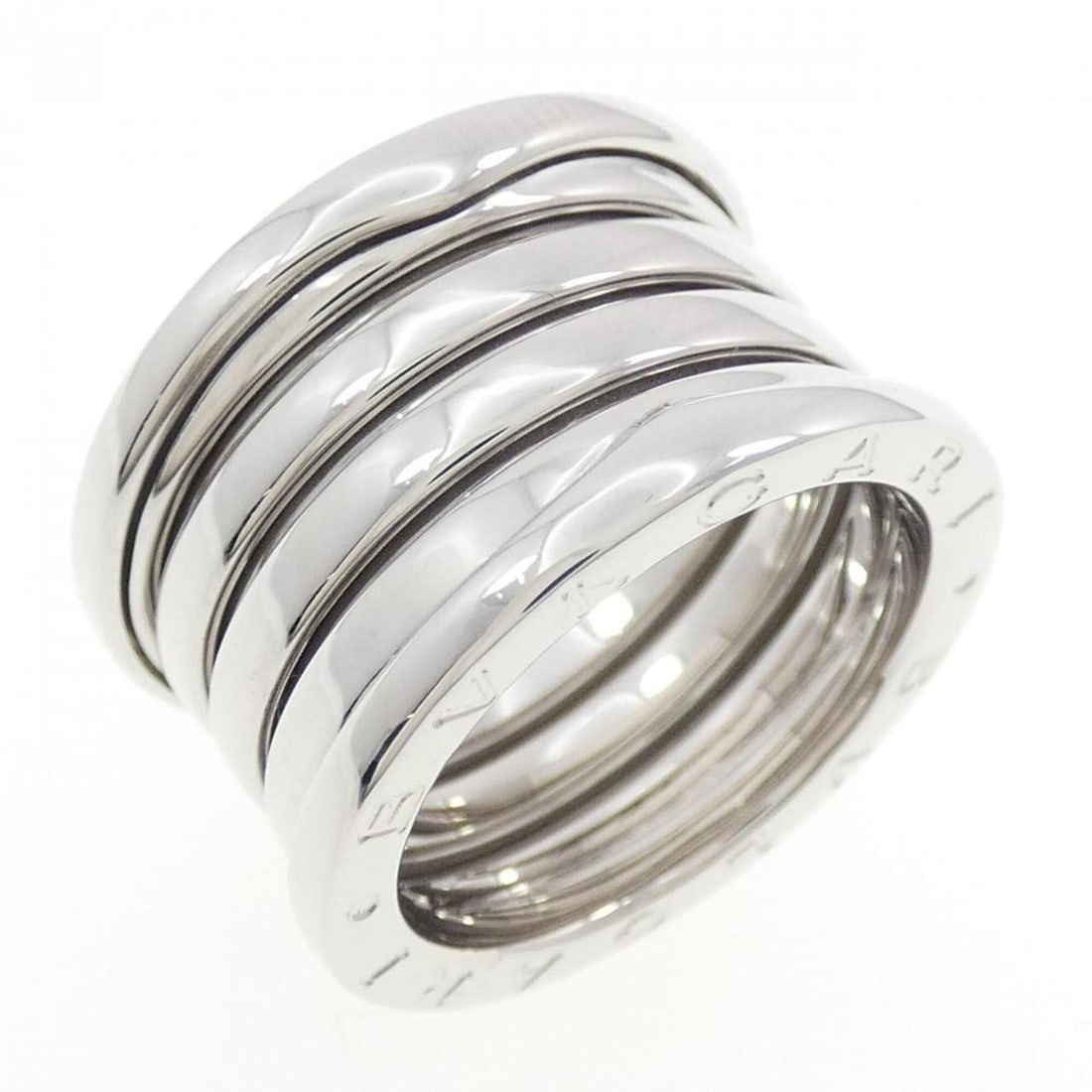 Bvlgari B.zero1 5-band ring: --- Catalog ---Category: SizeUS Size: 6.5Brand Size: 52Category: DesignType: Band ringGender: WomenMaterial: White gold (18K)Category: GeneralBrand: Bvlgari--- Item List ---Section: ConditionRanking: