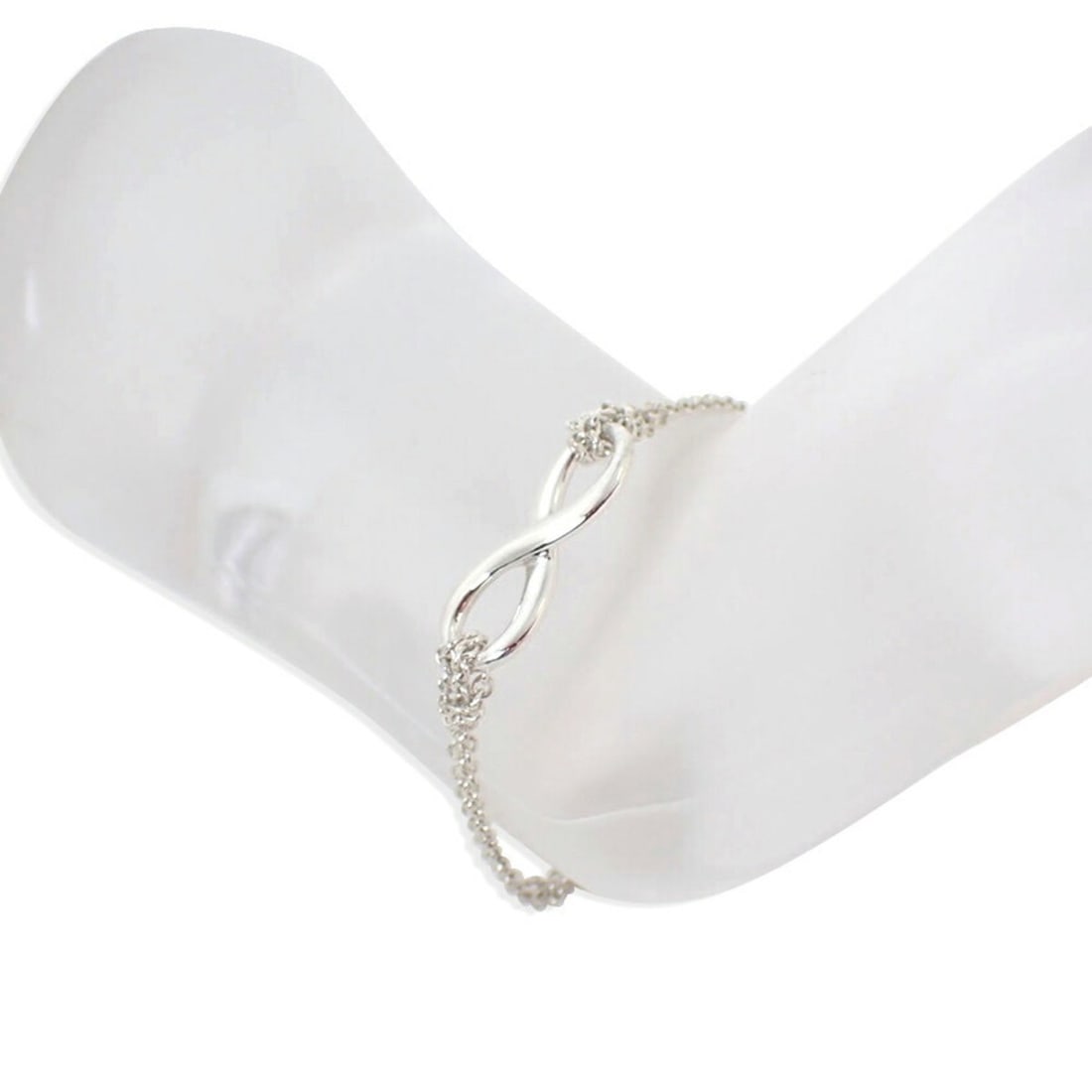 TIFFANY & Co. SV925 Infinity Bracelet: --- Catalog ---Category: SizeLength: 17cm / 6.69''Category: DesignType: Charm braceletGender: WomenMaterial: Silver 925Category: GeneralBrand: Tiffany--- Item List ---Section: ConditionRanking: Rank S
