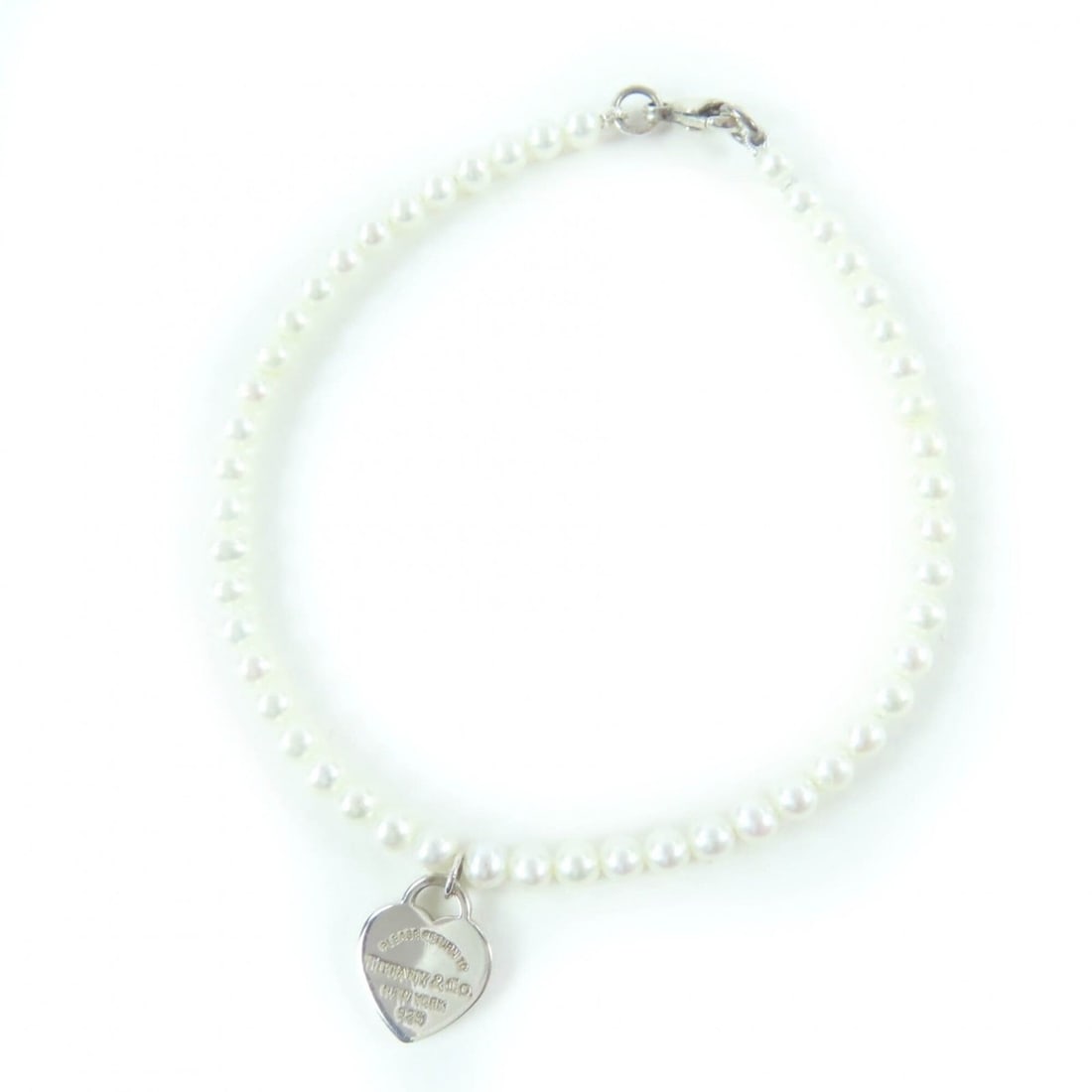 TIFFANY&Co. Tiffany Return to Mini Heart Tag Bracelet, 925 Sterling Silver, Freshwater Pearl, with: --- Catalog ---Category: SizeLength: 18cm / 7.08''Category: DesignType: Charm braceletColor: SilverGender: WomenMaterial: Silver 925Category: GeneralBrand: Tiffany--- Item List ---Section: ConditionRa