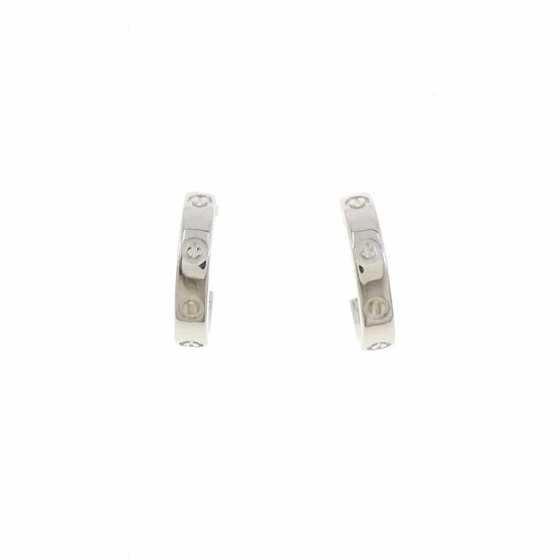 Cartier Mini Love Earrings: --- Catalog ---Category: SizeSize (HxWxD): 12.70mm x 2.60mm / 0.50'' x 0.10''Category: DesignType: Stud earringsGender: WomenMaterial: White gold (18K)Category: GeneralBrand: Cartier--- Item List